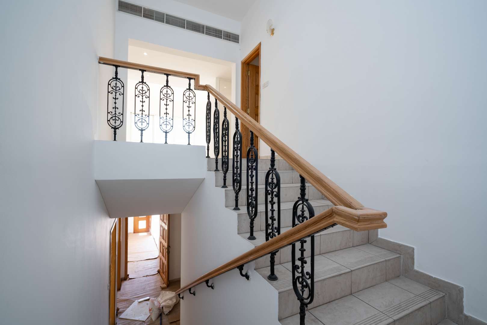 Open entrance of 4-bed villa in Al Wasl, Jumeirah, showcasing bright interior space