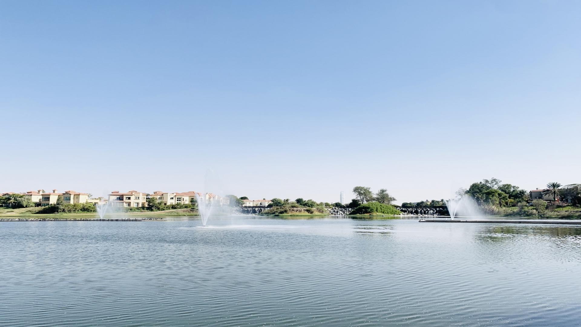 Luxurious living room in fully furnished villa, Jumeirah Islands, with elegant decor and seating