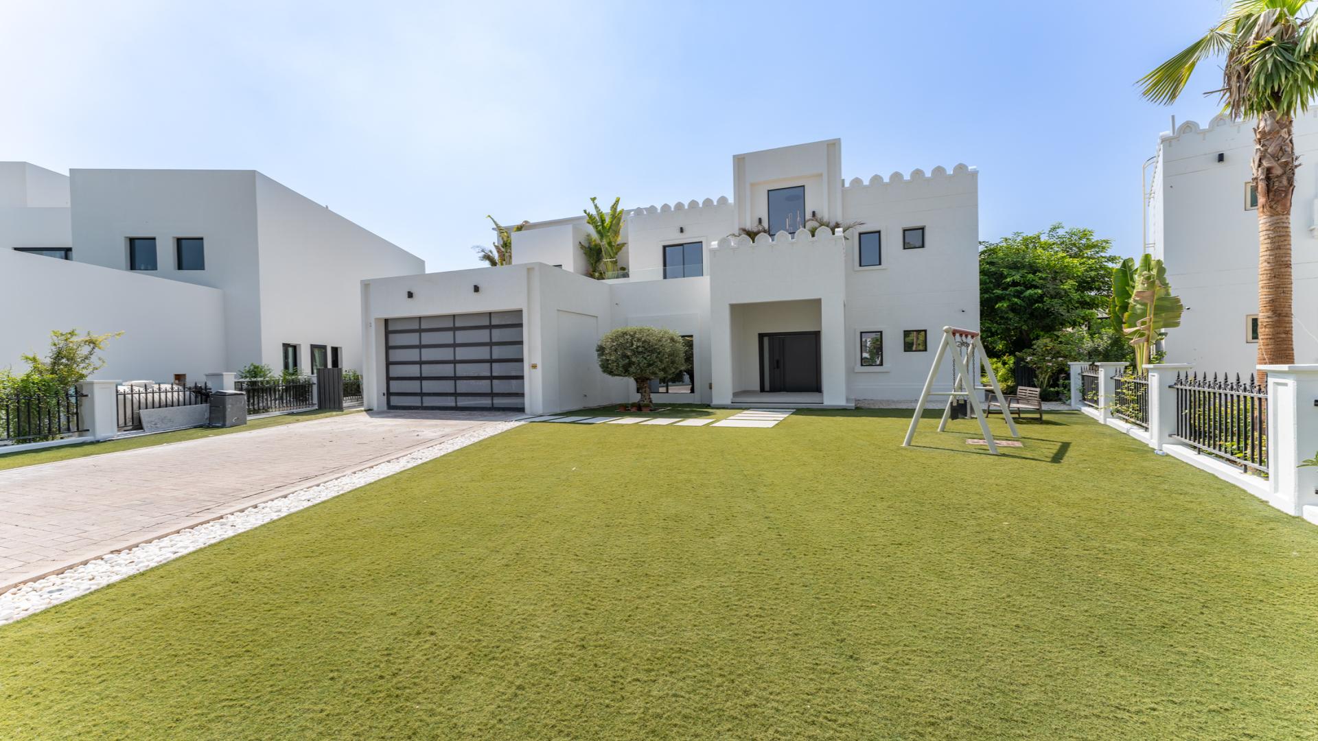 Luxurious villa pool with serene lake views in Jumeirah Islands, Islamic Clusters