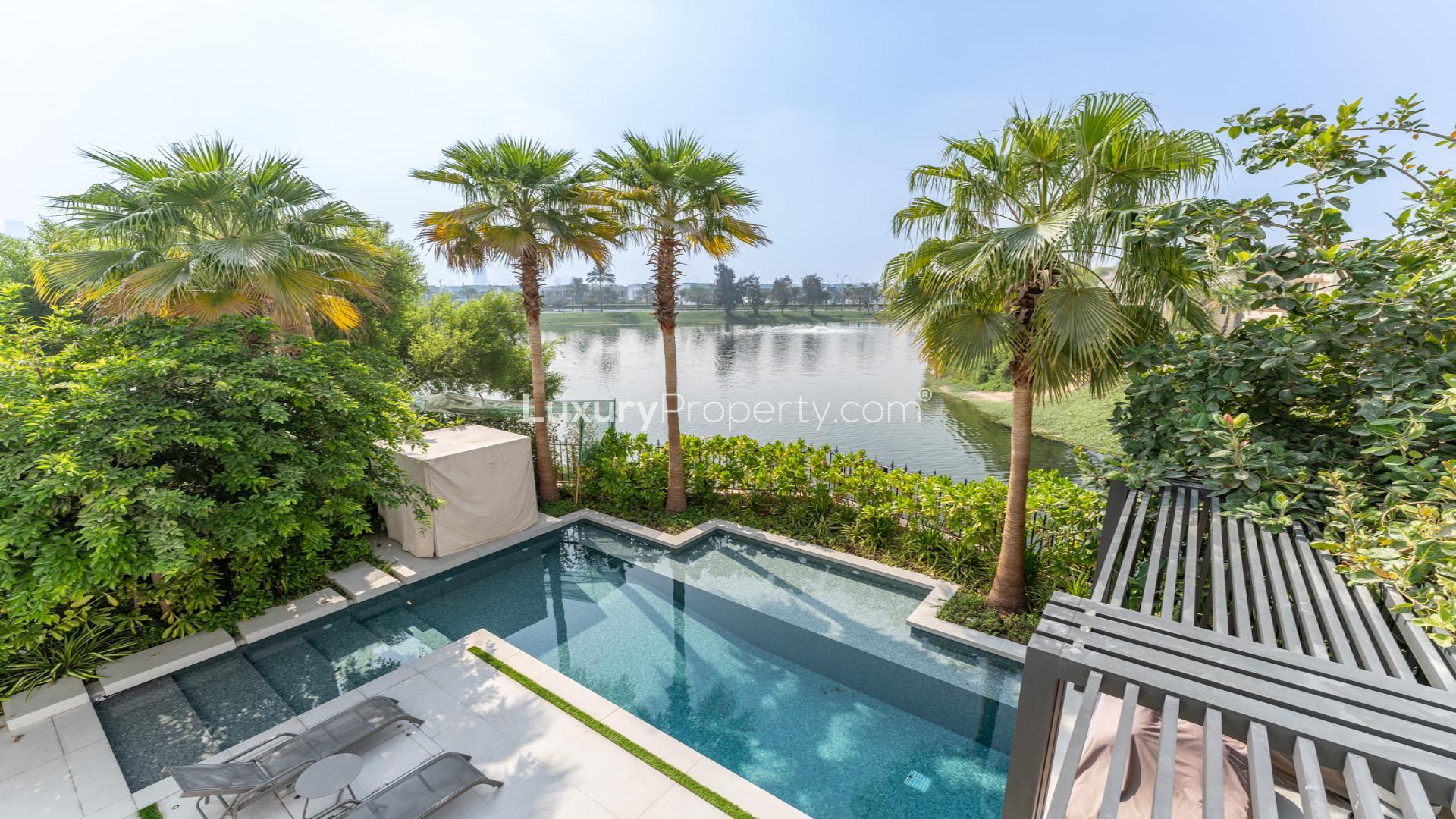 Luxurious villa patio with pool and garden views in Jumeirah Islands, Islamic Clusters