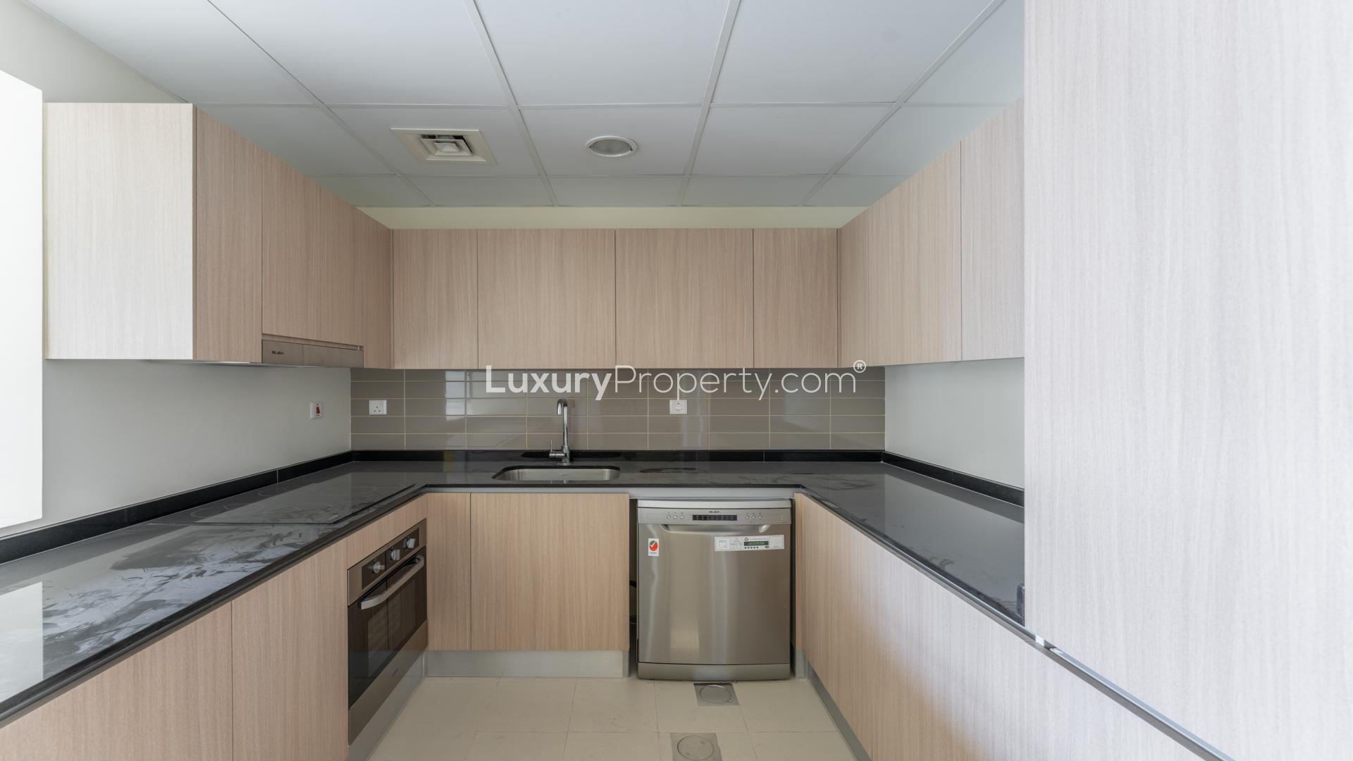 Bright living area with large windows in District 11 villa, Mohammed Bin Rashid City