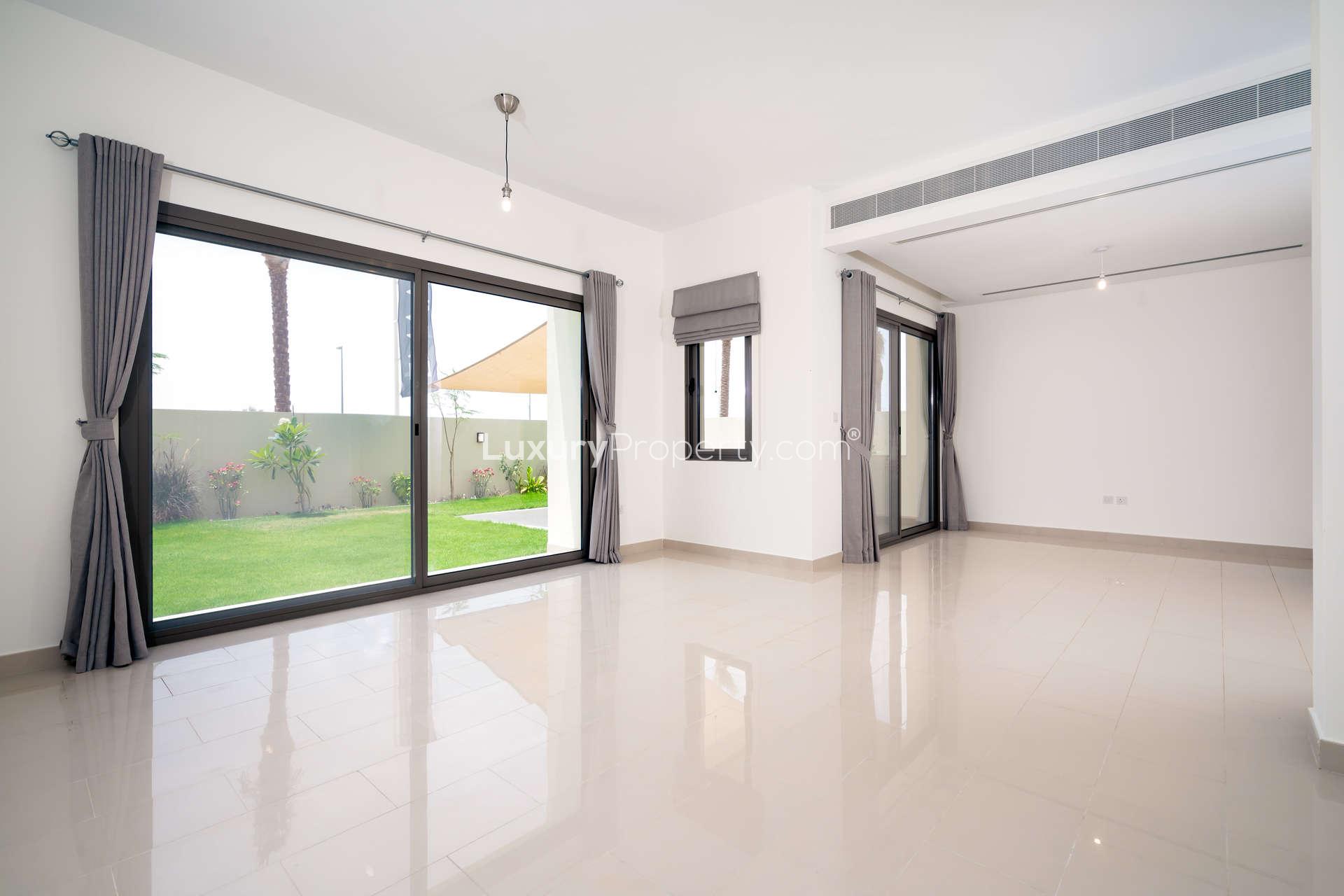 Spacious living room with garden view in 4-bedroom villa, Azalea, Arabian Ranches 2