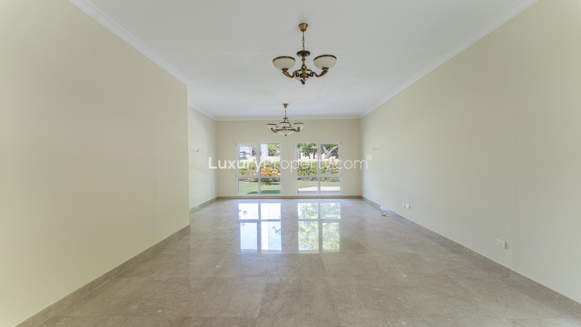 Exterior view of 4-bedroom villa with lush garden in Meadows 8, for rent