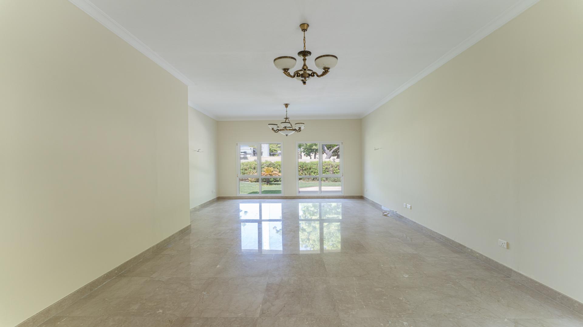 Exterior view of 4-bedroom villa with lush garden in Meadows 8, for rent