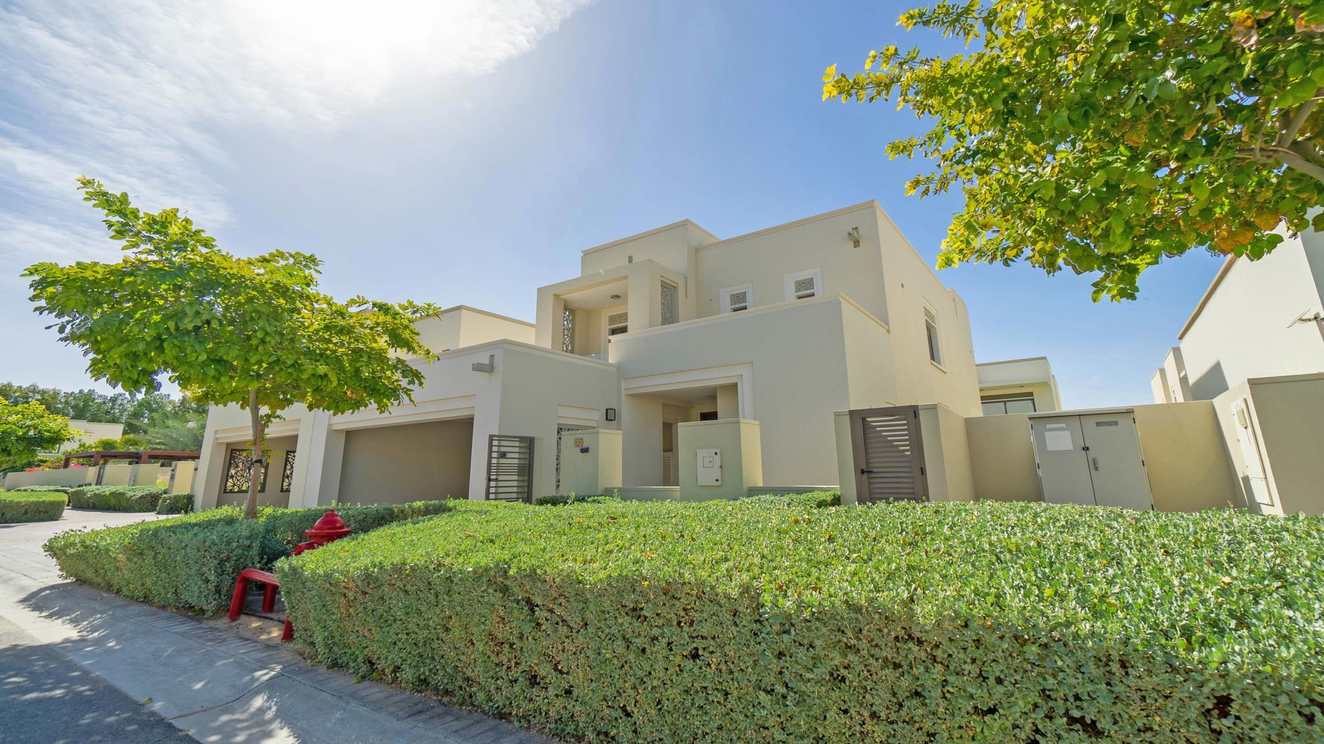 "Beautifully landscaped 4-bedroom villa in Azalea, Arabian Ranches 2, available for rent.",Spacious living area in Azalea villa, Arabian Ranches 2, with natural light and modern design