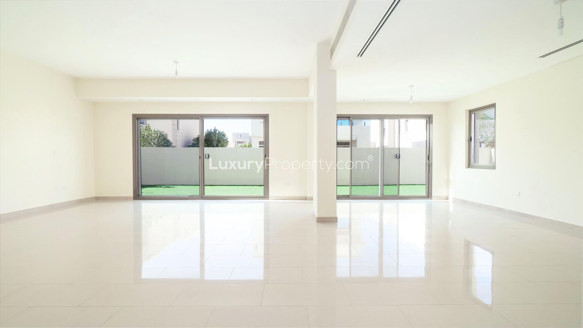 "Enhanced 4-bedroom villa with landscaped garden in Azalea, Arabian Ranches 2, for rent.",Bright, spacious living room in Arabian Ranches 2 Azalea villa for rent, LP39723