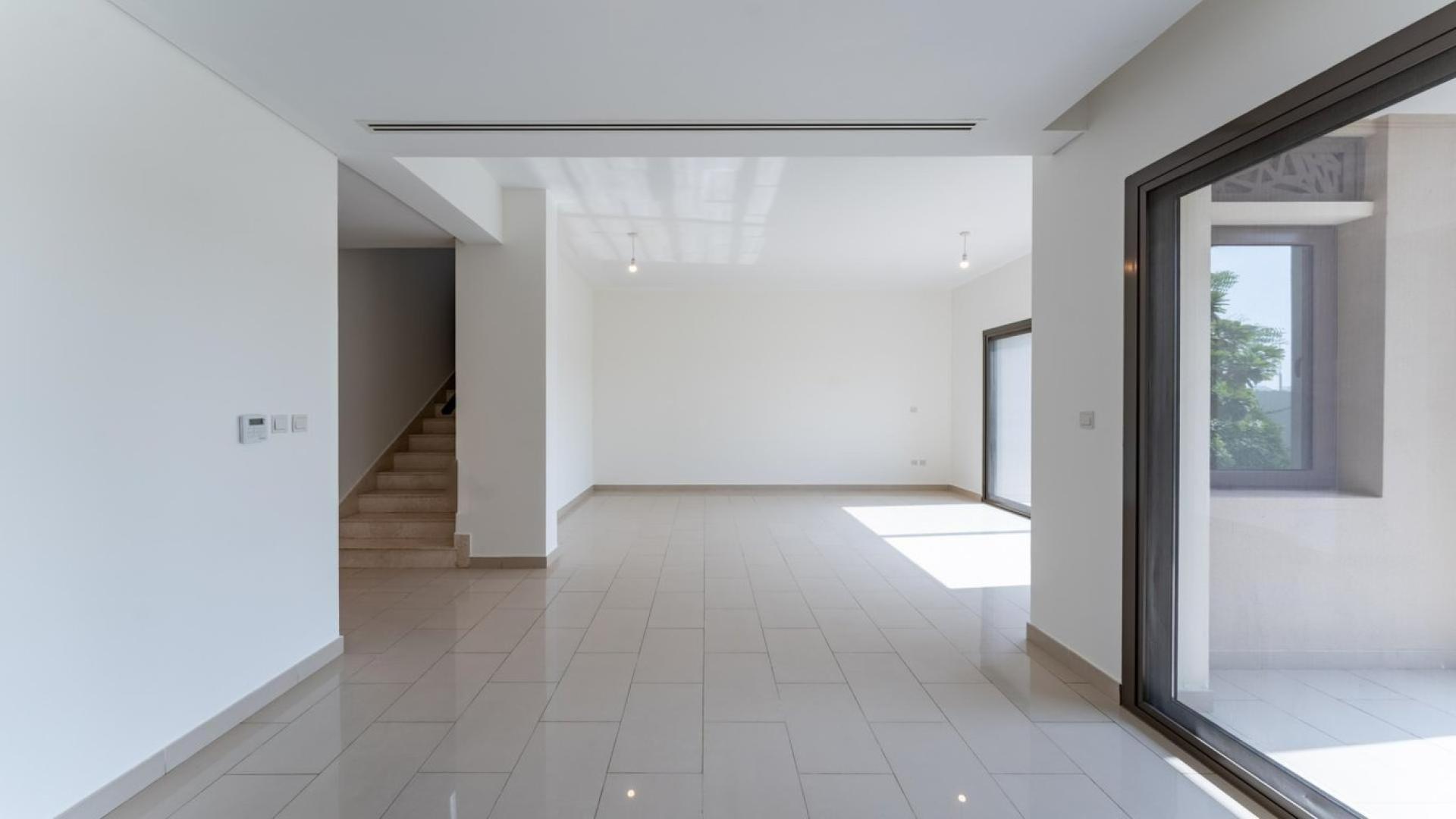 Spacious villa interior with garden view in Azalea, Arabian Ranches 2, available for rent