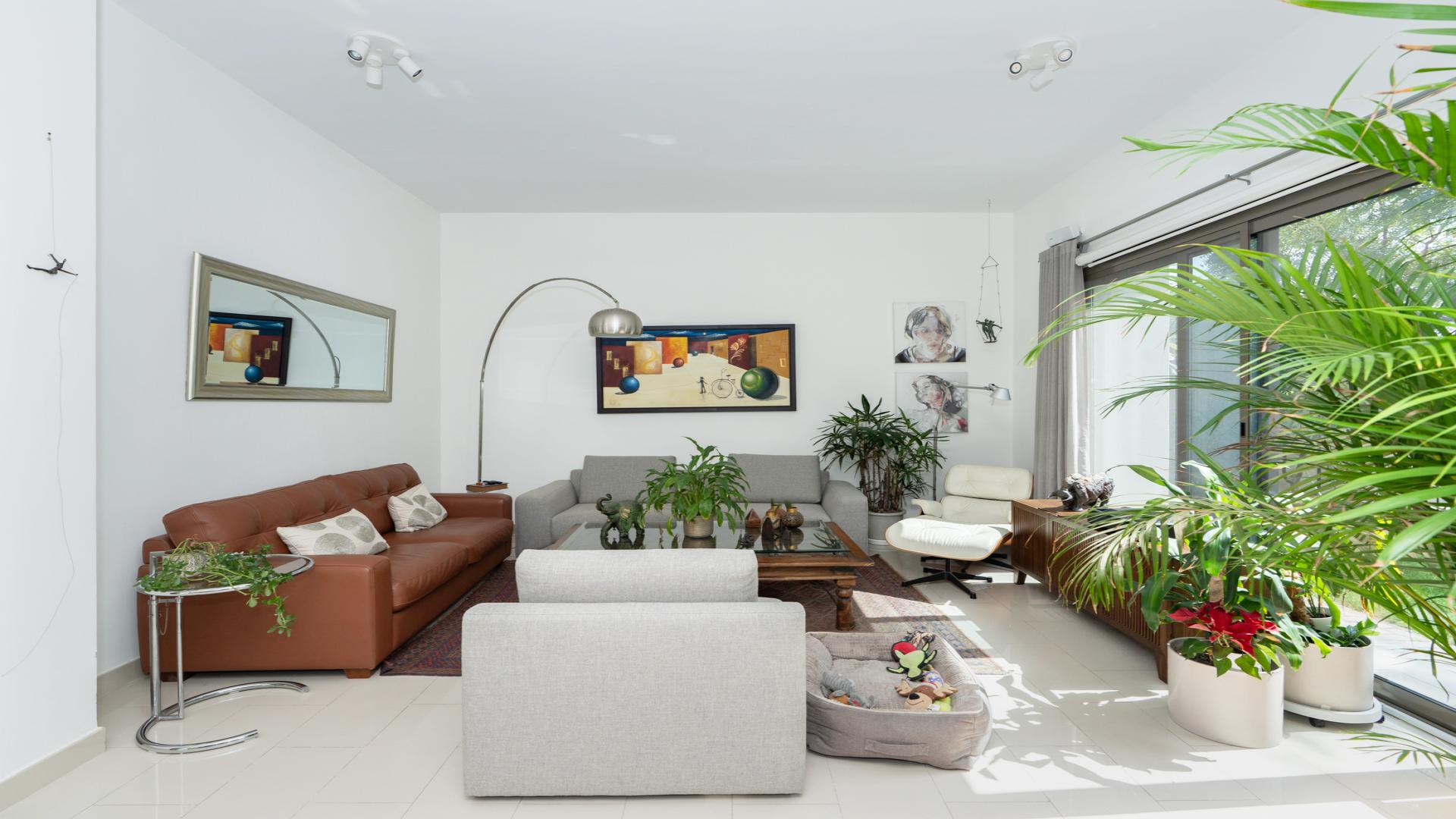 Spacious living room with modern decor in 4-bedroom villa, Azalea, Arabian Ranches 2