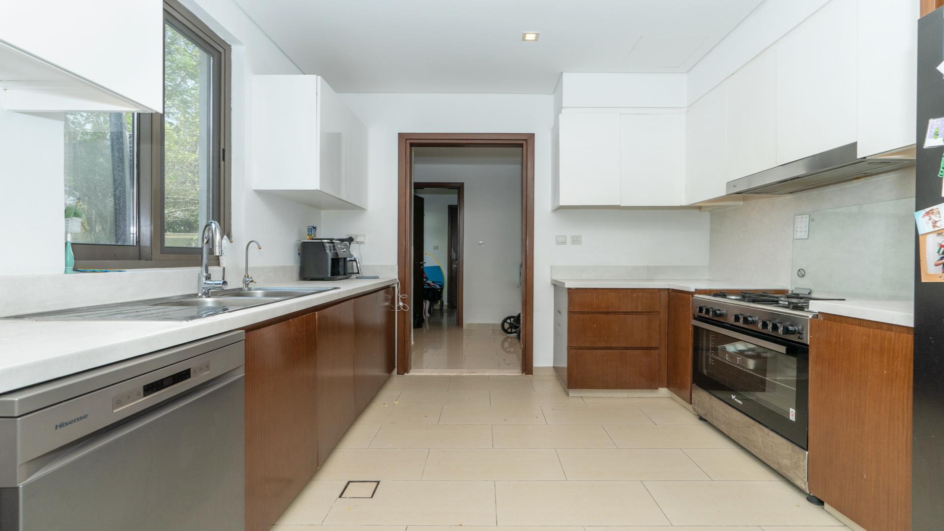 Modern kitchen in upgraded 4-bedroom villa, Arabian Ranches 2, Azalea, available for rent