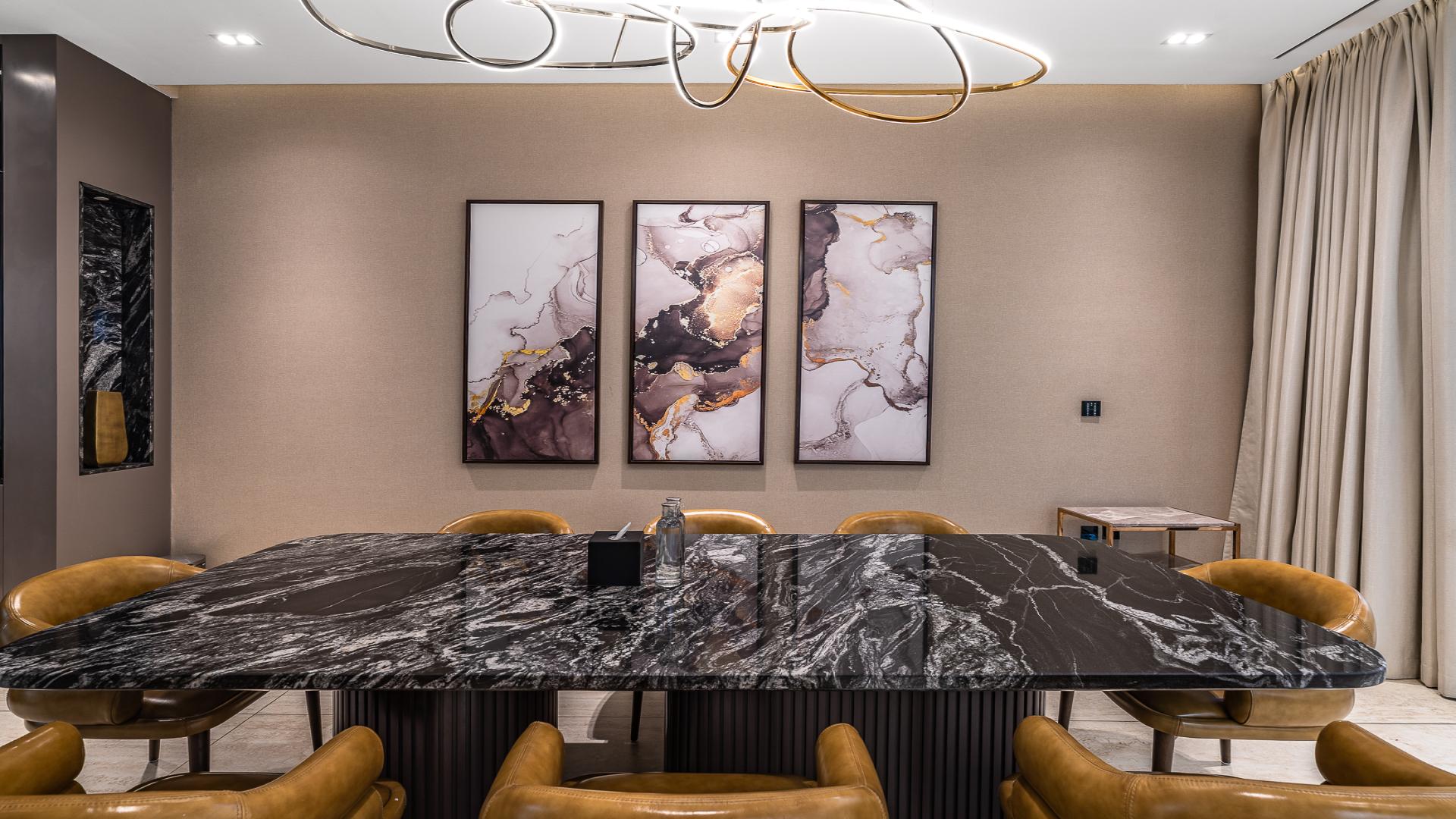 Luxurious dining and living area in Al Sufouh villa for rent, modern interior design