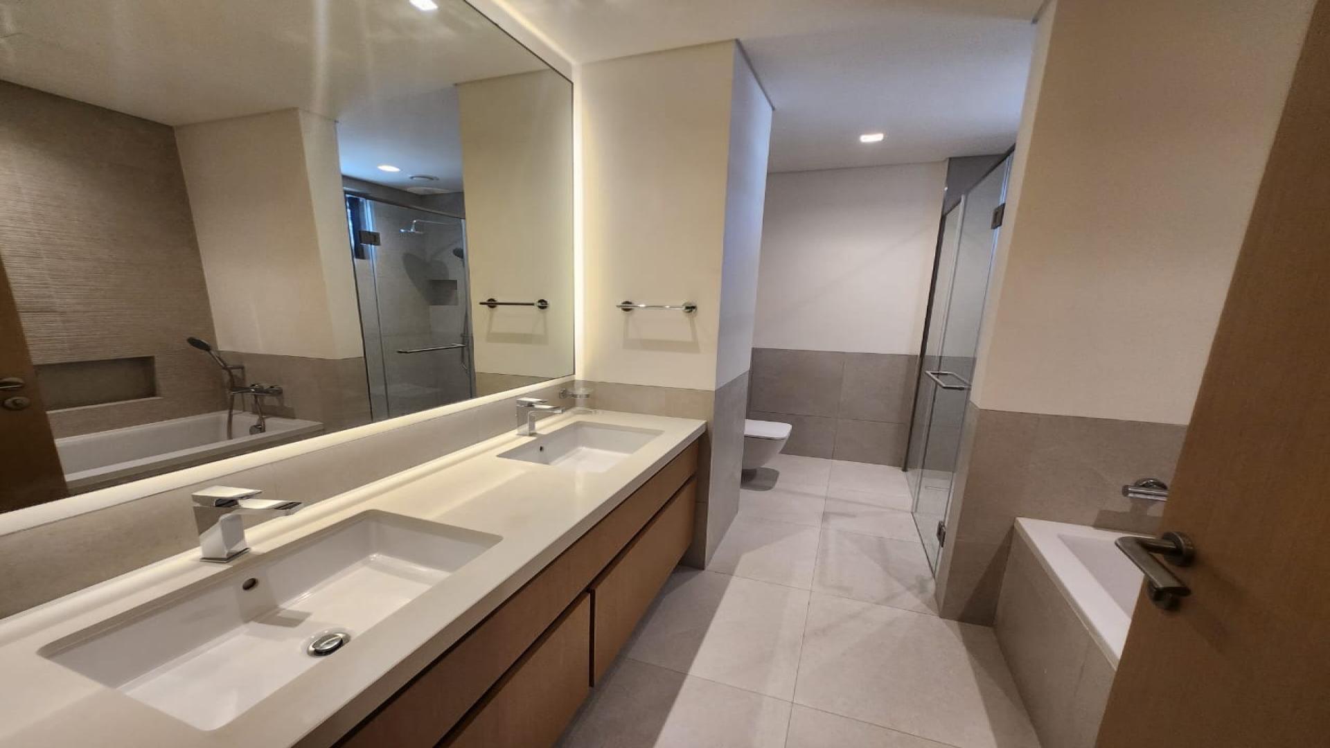 Modern villa interior with staircase and large windows in Tilal Al Furjan, Al Furjan