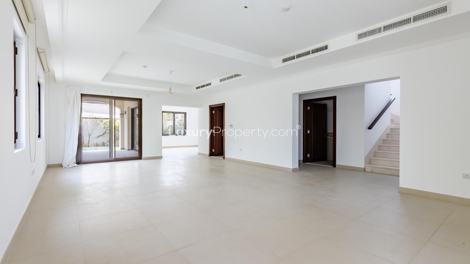 Modern kitchen with wooden cabinets in 4-bedroom villa for rent, Lila, Arabian Ranches 2
