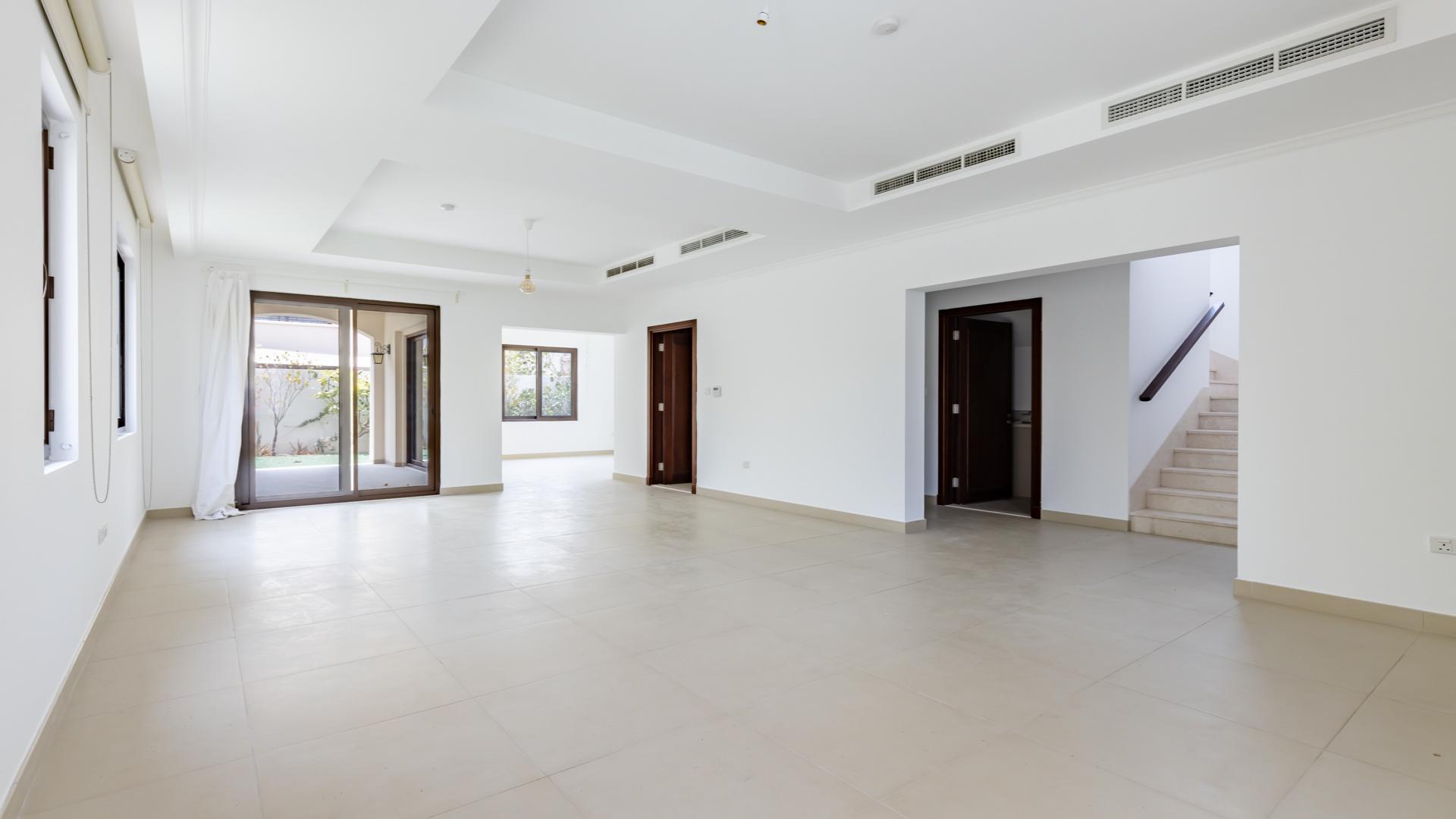 Modern kitchen with wooden cabinets in 4-bedroom villa for rent, Lila, Arabian Ranches 2