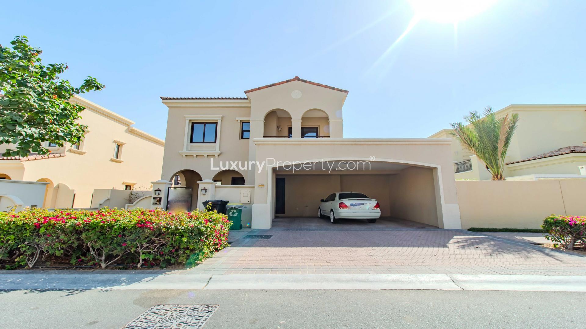 Stylish 4-bed villa exterior in Lila, Arabian Ranches 2, with driveway and garden
