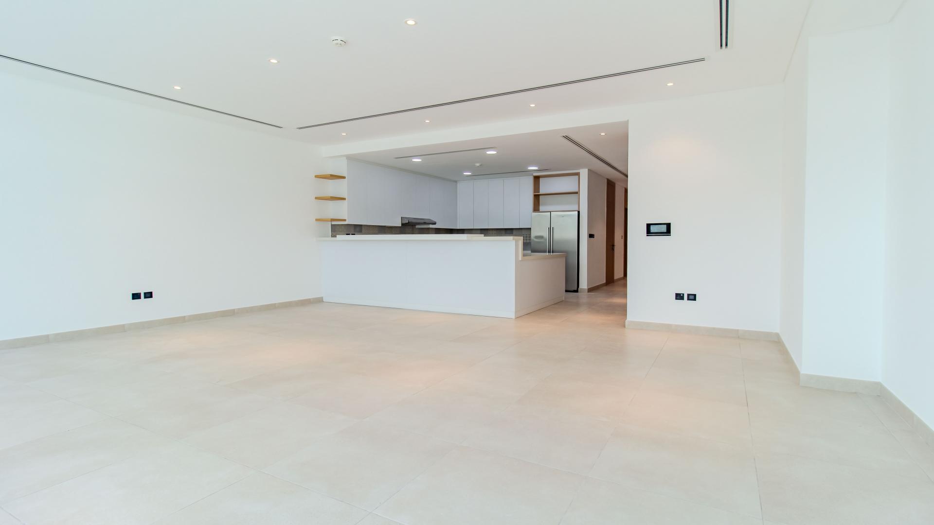 Empty bedroom in Jumeirah Luxury villa, featuring built-in wardrobe and modern design