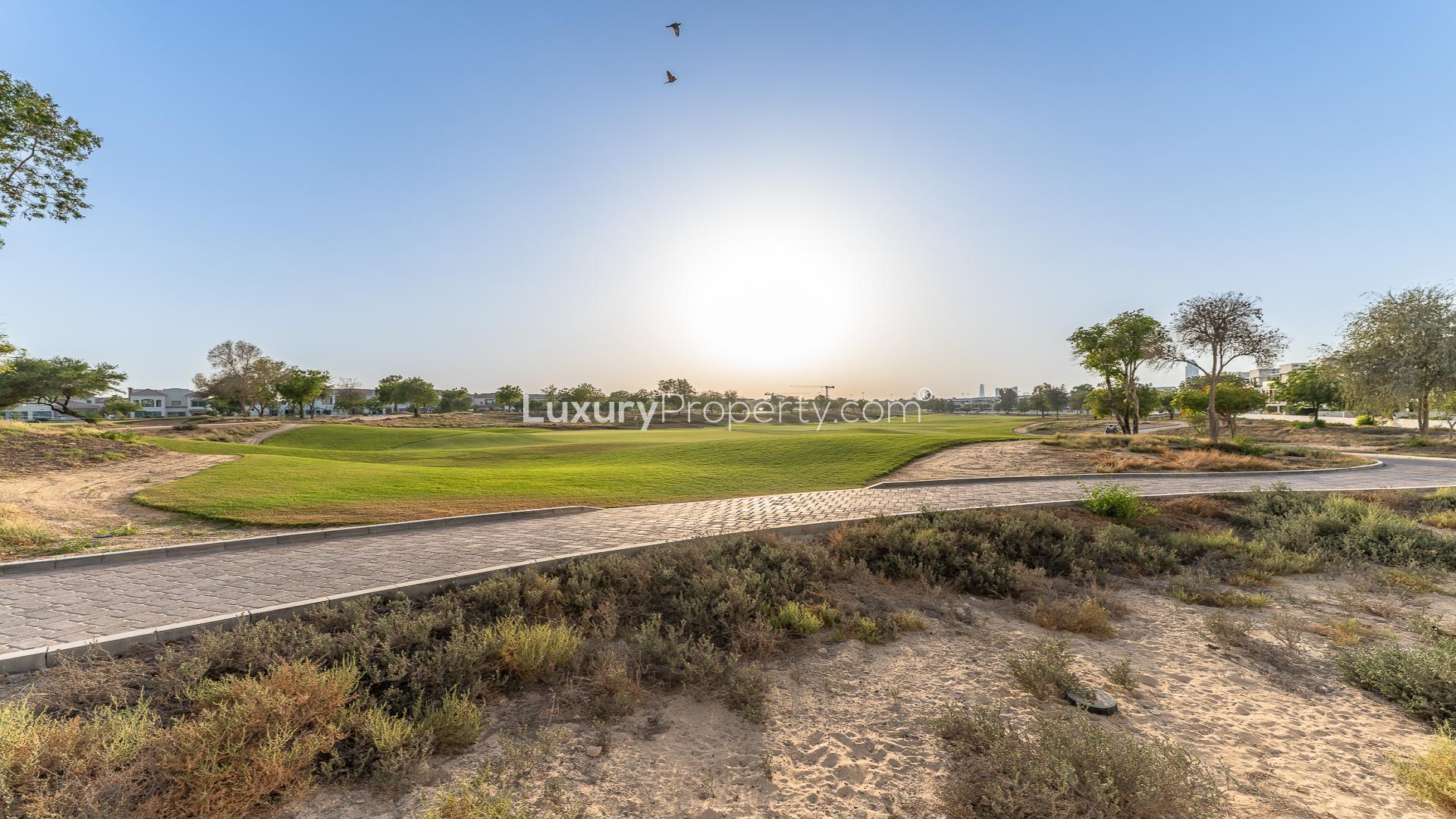 Golf course view at Jumeirah Golf Estates near spacious 4-bedroom villa for rent