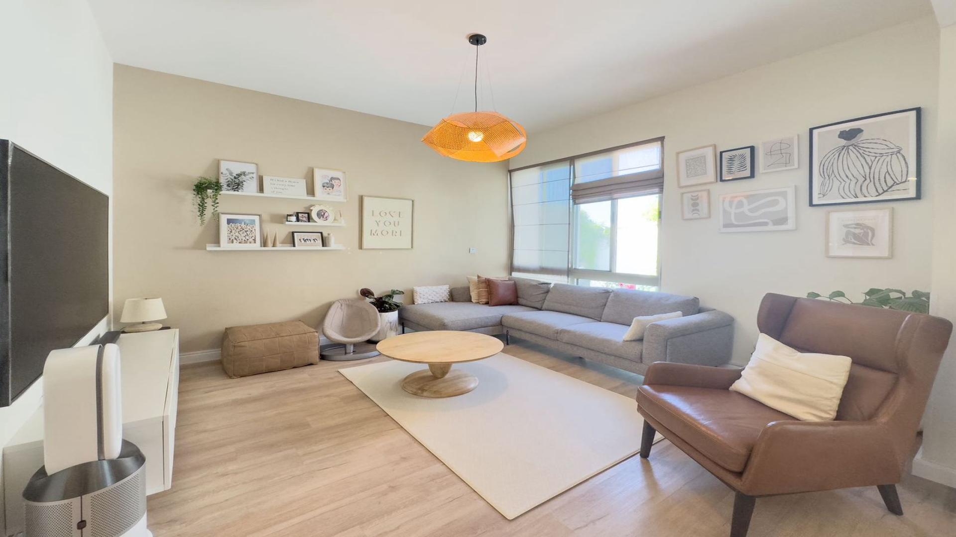 Modern 4-bedroom villa exterior in Arabian Ranches 2 Reem, available for rent