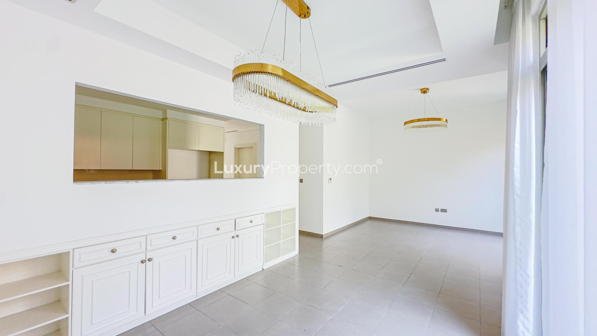 Beautiful villa garden with pergola and vibrant flowers in Arabian Ranches 2, Reem Community