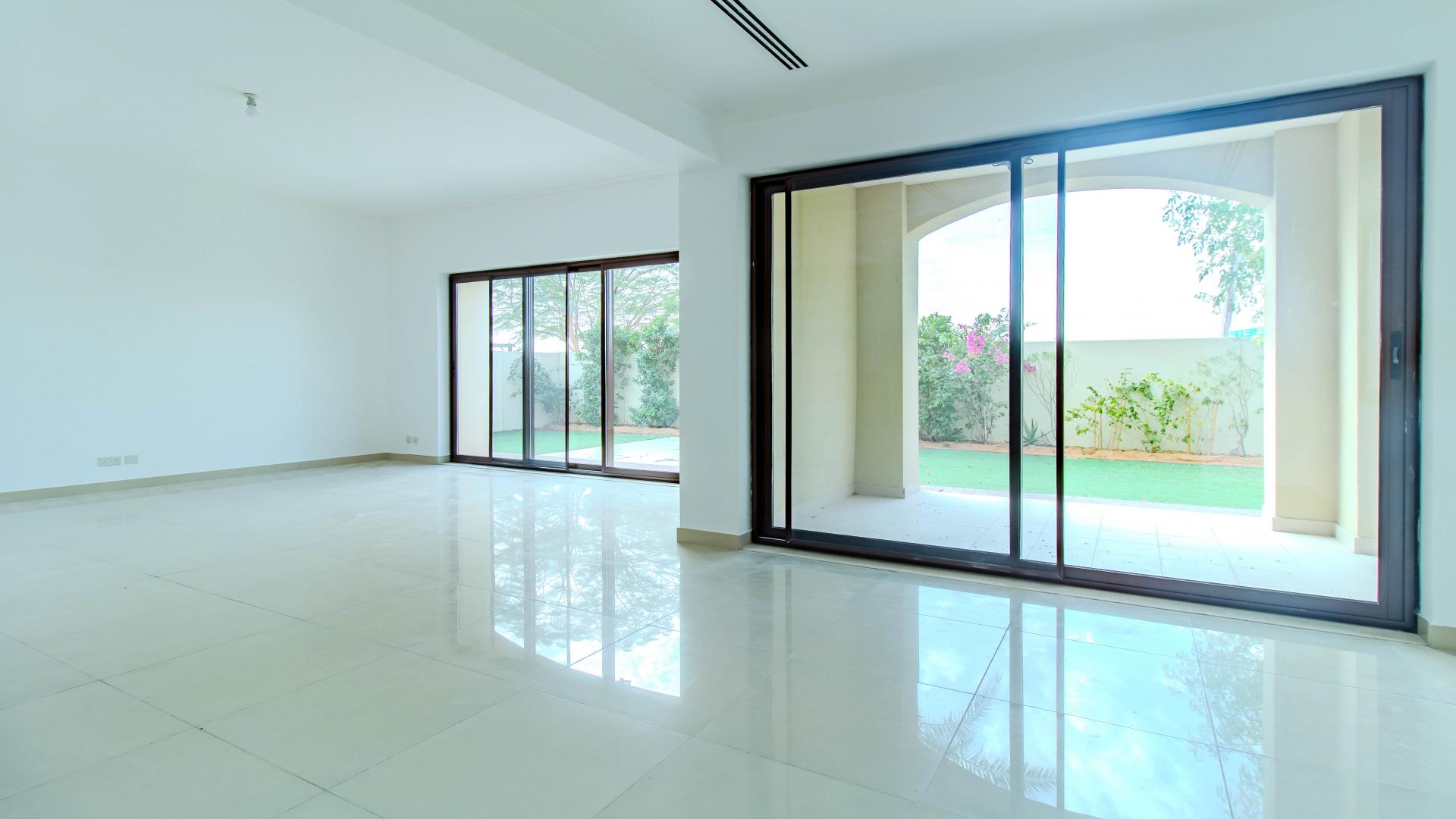 Bright living room with garden view in Samara villa, Arabian Ranches 2