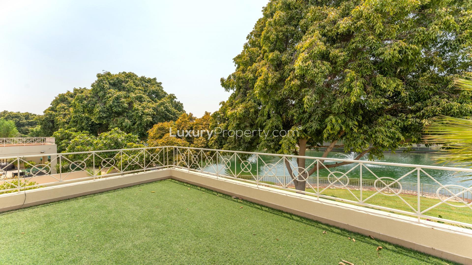 Luxurious living room in 4-bedroom villa, Deema, The Lakes, with elegant decor and chandelier