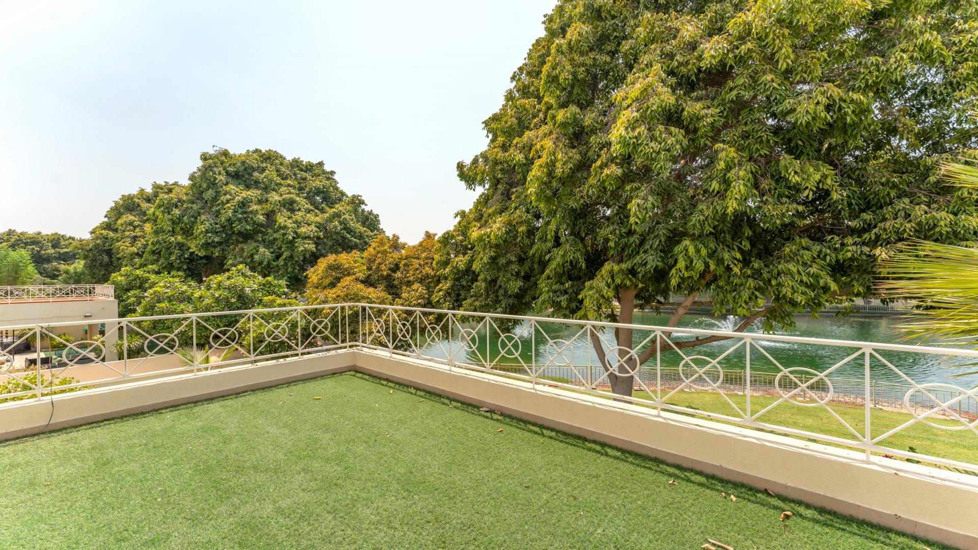 Luxurious living room in 4-bedroom villa, Deema, The Lakes, with elegant decor and chandelier