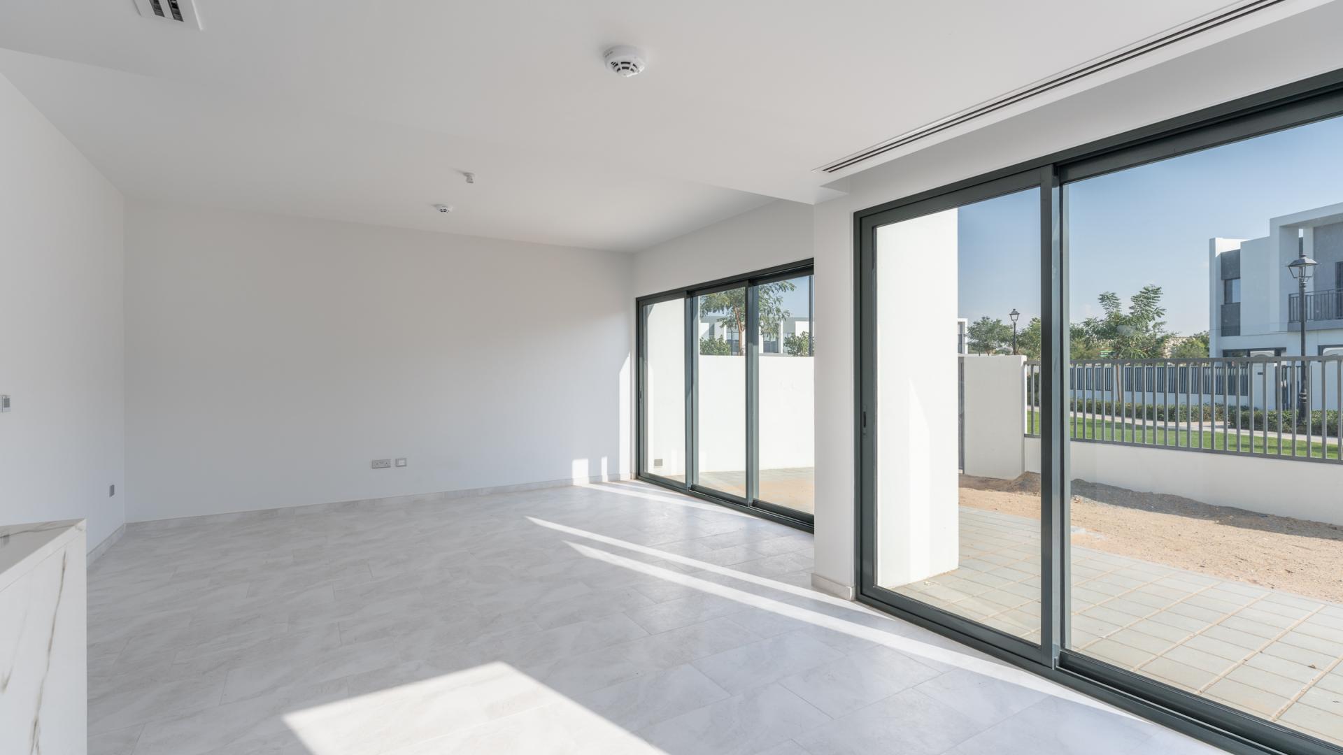 Bright, modern kitchen and living area in Villanova villa, Dubai Land