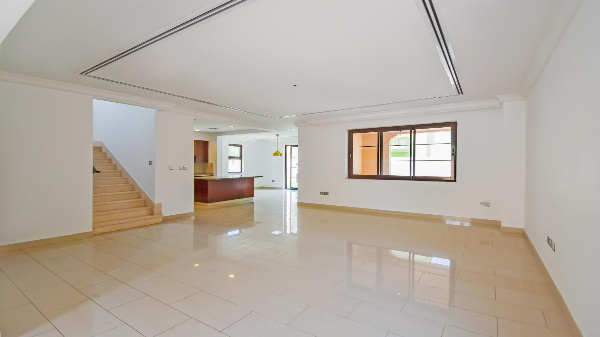 Spacious living room with open kitchen in Casa community villa, Arabian Ranches 2