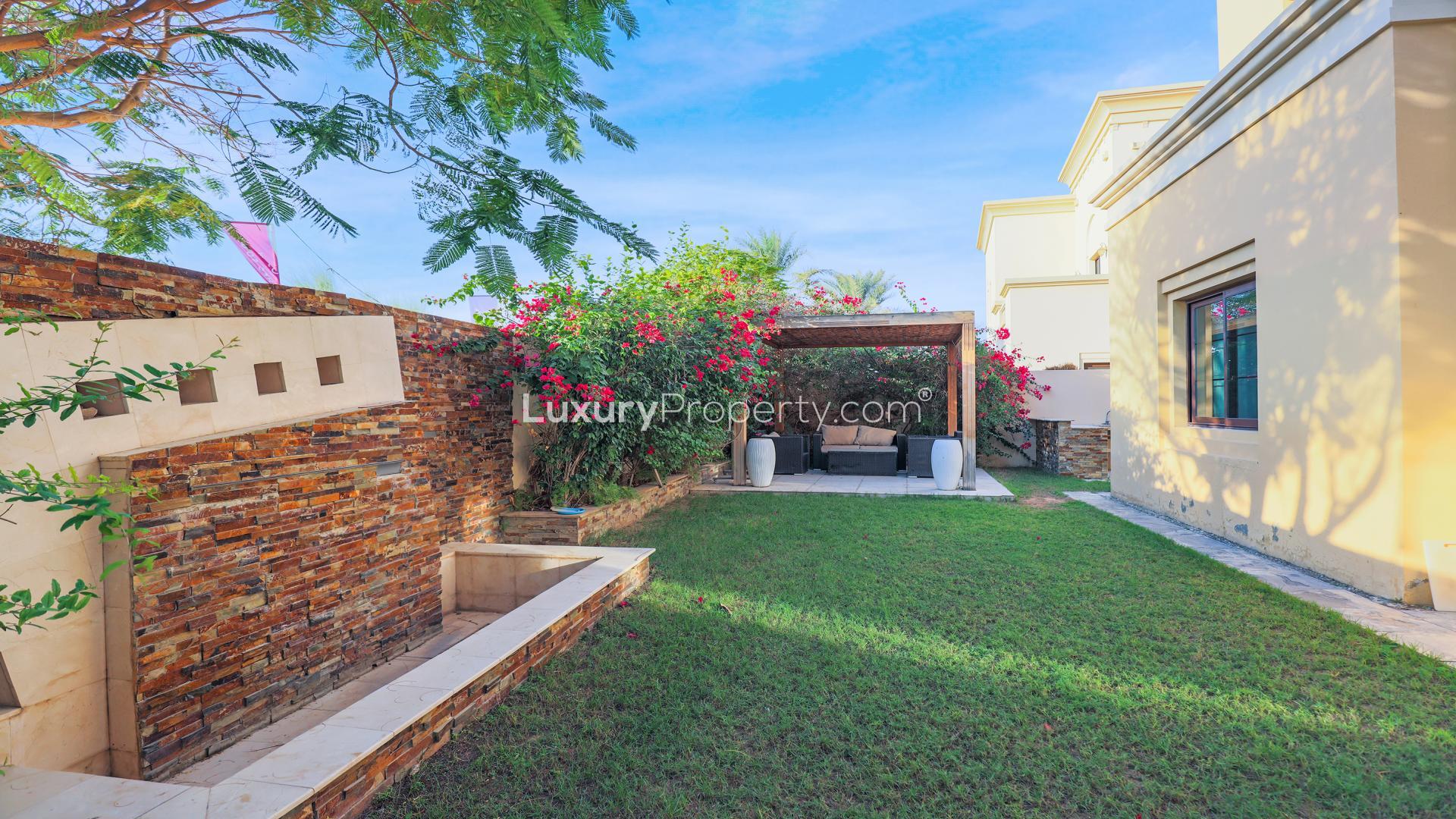 Upgraded villa with landscaped garden and carport in Arabian Ranches 2, Casa community