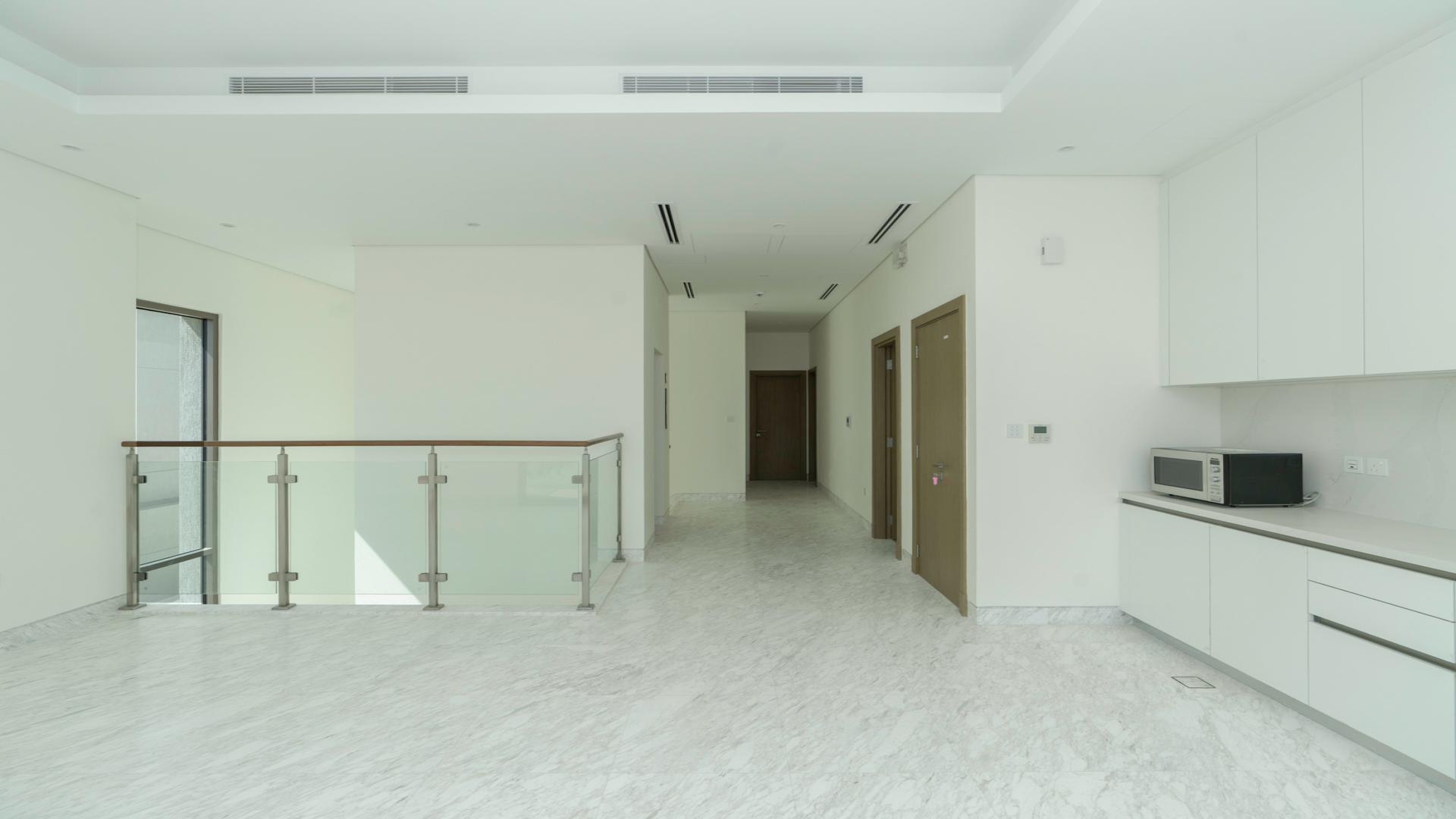 "Spacious hallway in 4-bedroom villa, District One, Mohammed Bin Rashid City, for rent.",Modern kitchen in 4-bedroom villa, District One, Mohammed Bin Rashid City for rent