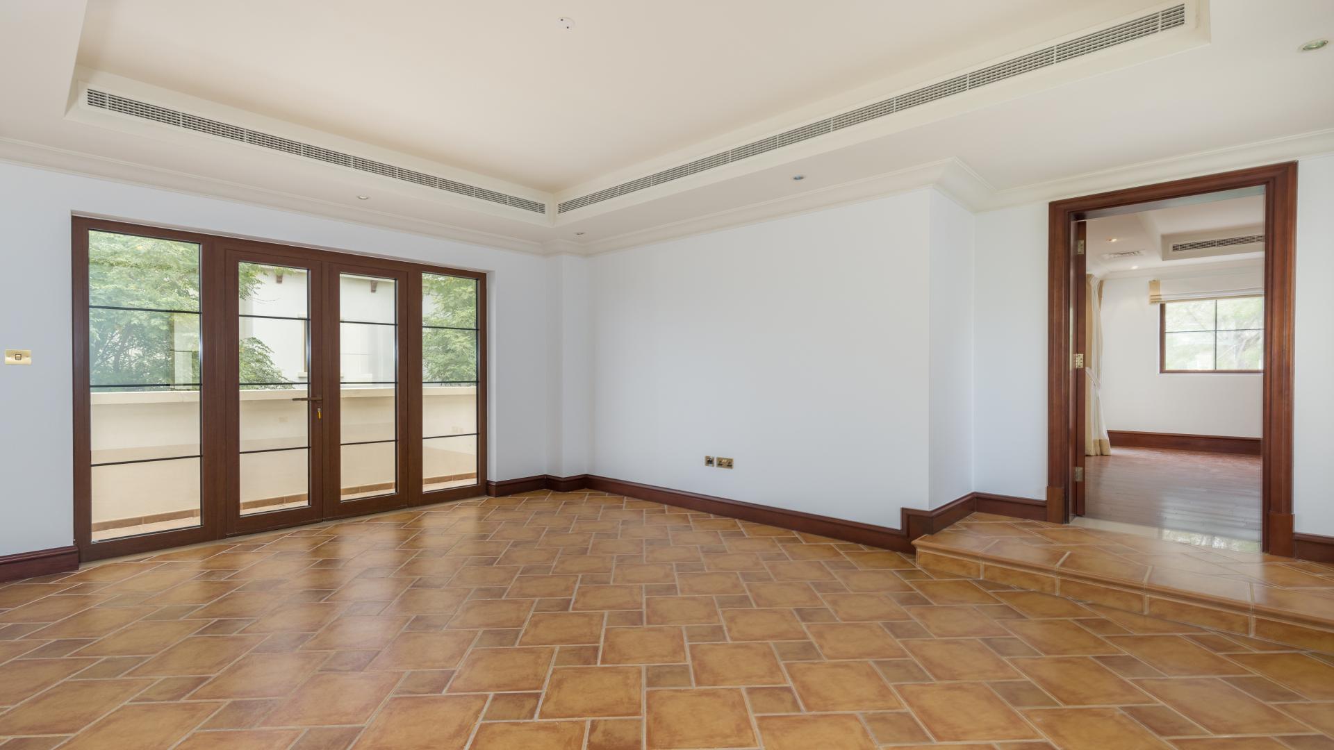 Spacious villa interior with large windows, Jumeirah Golf Estates, Earth community, for rent