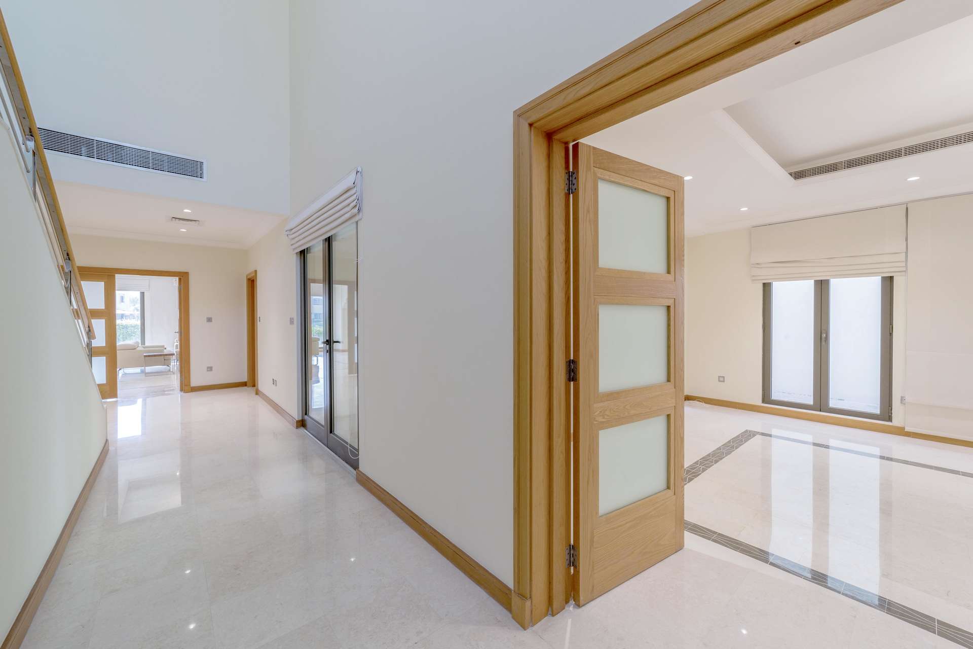 Atrium Entry Garden Home Villa interior with staircase, Palm Jumeirah, available for rent