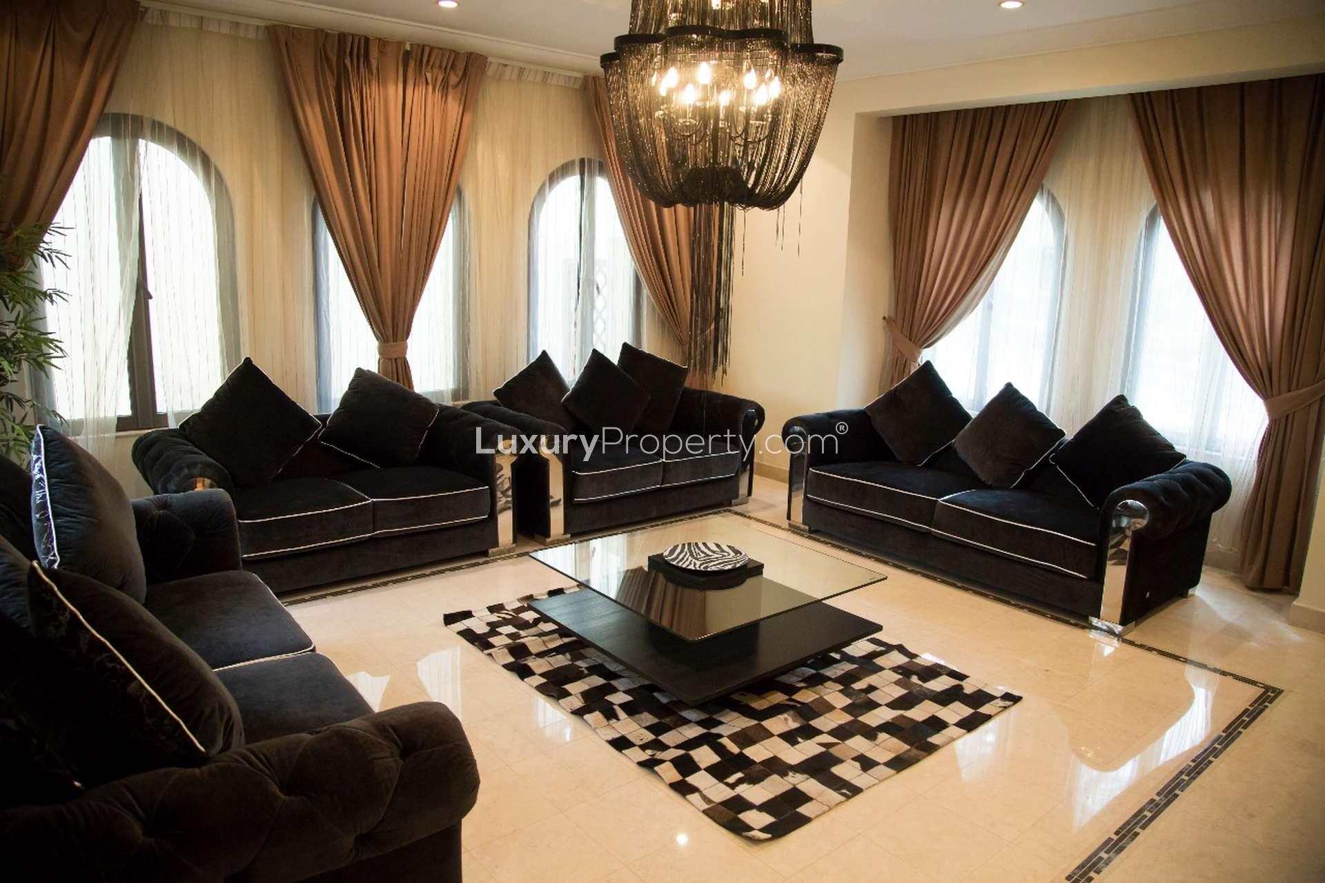 Luxury 4-bedroom villa exterior on Frond D, Palm Jumeirah, available for rent