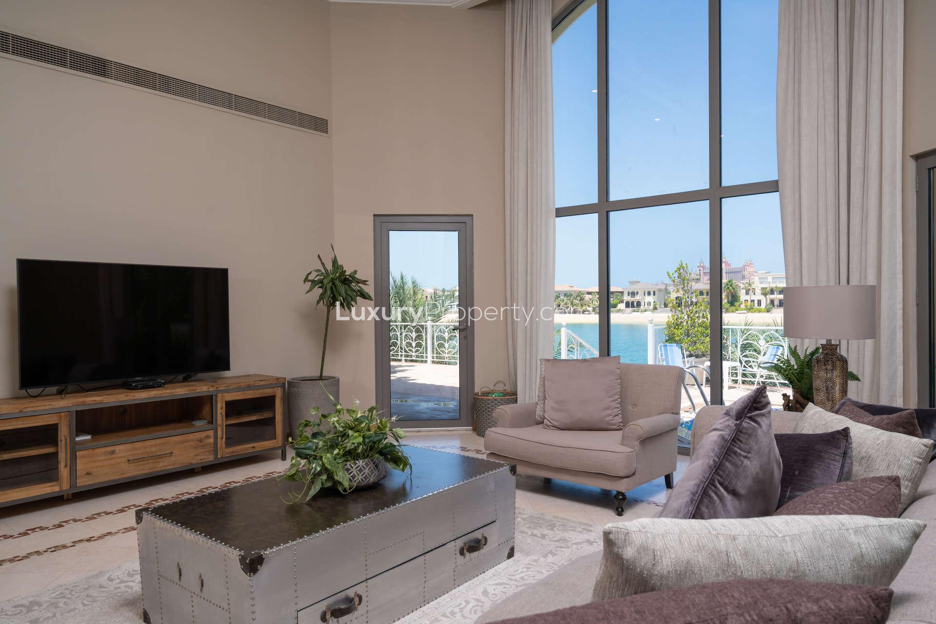 Luxurious living room in four-bedroom villa at Palm Jumeirah, featuring elegant decor