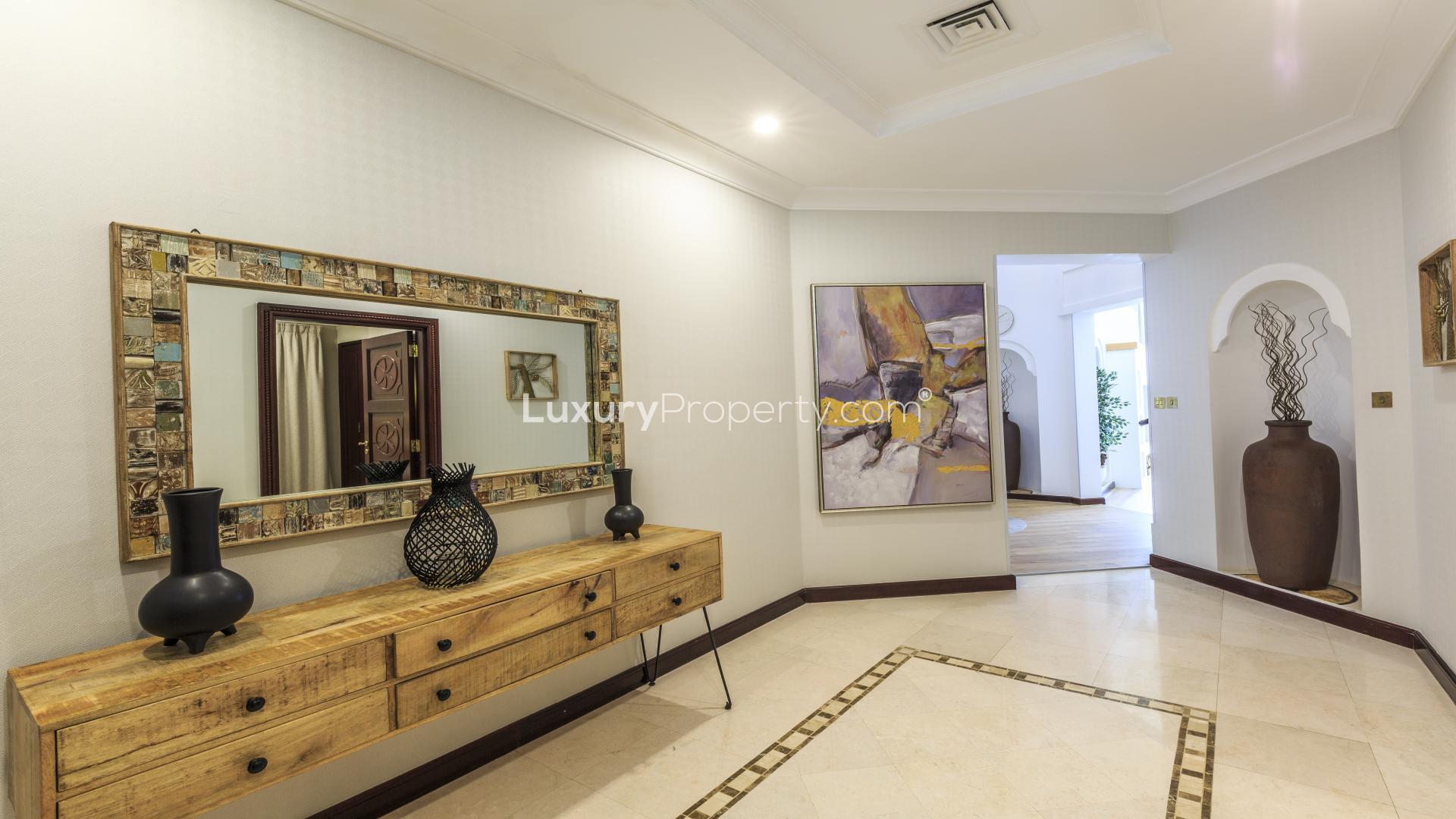 Upgraded 4-bedroom Palm Jumeirah villa exterior with patio and terrace, Garden Homes