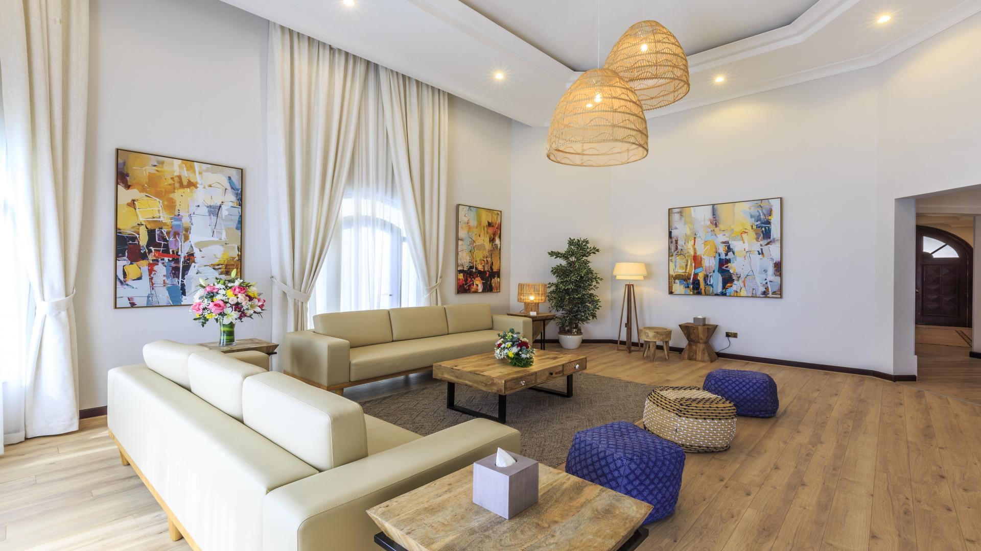 Luxurious living room in upgraded Palm Jumeirah villa, elegant decor and modern furnishings