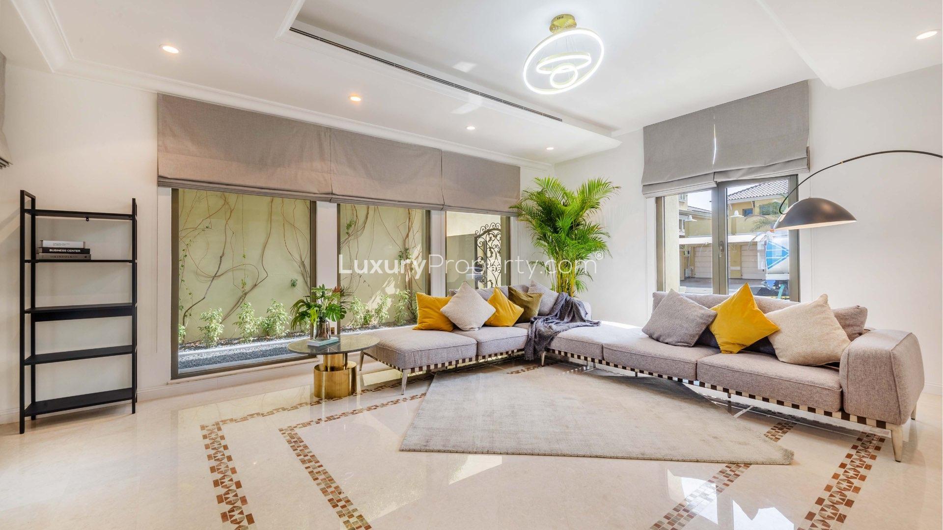 Upgraded Palm Jumeirah villa pool with Atlantis view, luxurious beachfront living in Dubai