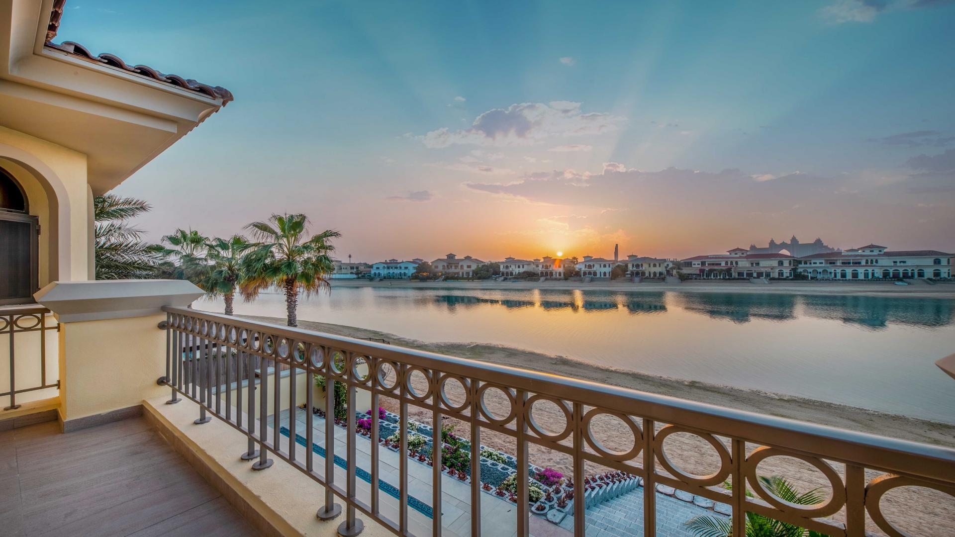 Luxurious living room in upgraded Palm Jumeirah villa with modern decor and natural light