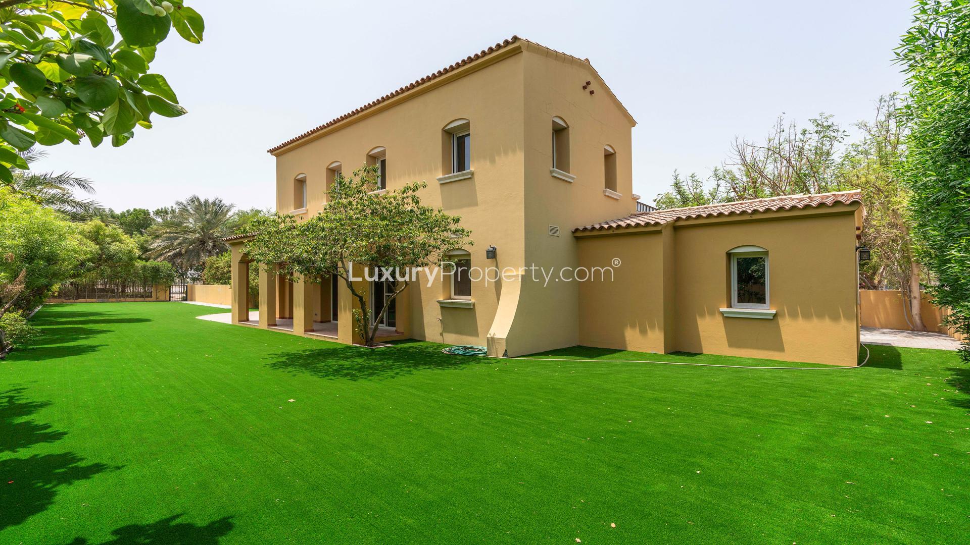 Spacious living room with garden view in Palmera Mediterranean-style villa, Arabian Ranches