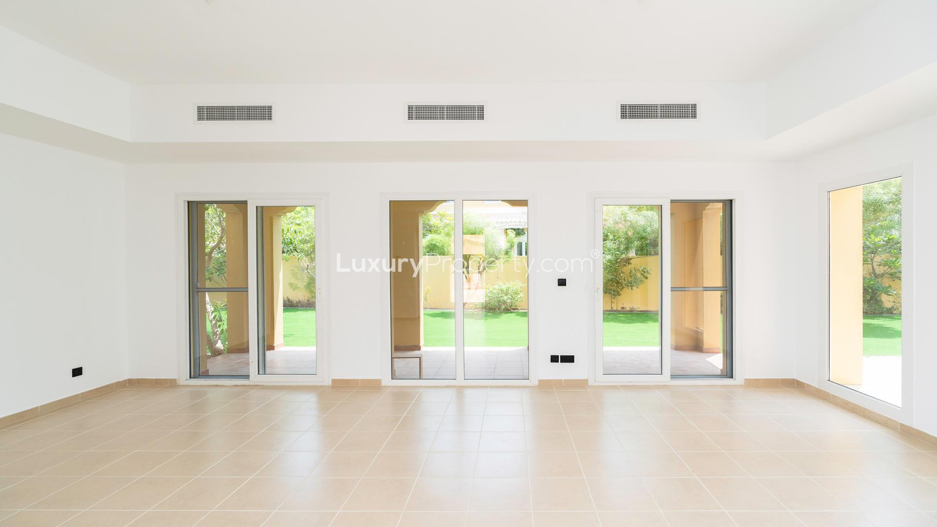 Spacious green lawn of four-bedroom Mediterranean villa in Palmera, Arabian Ranches for rent