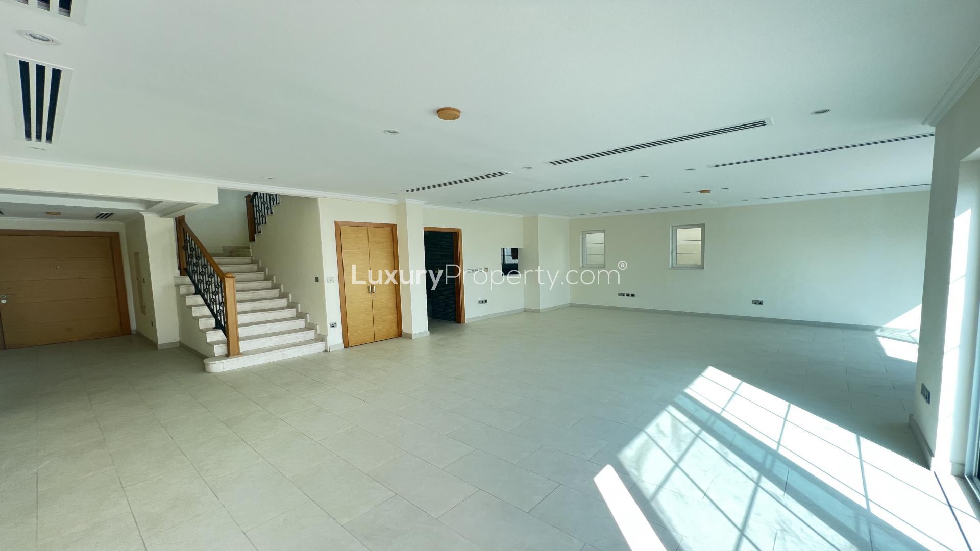 Spacious living area in a four-bedroom villa, Jumeirah Park, Legacy, available for rent