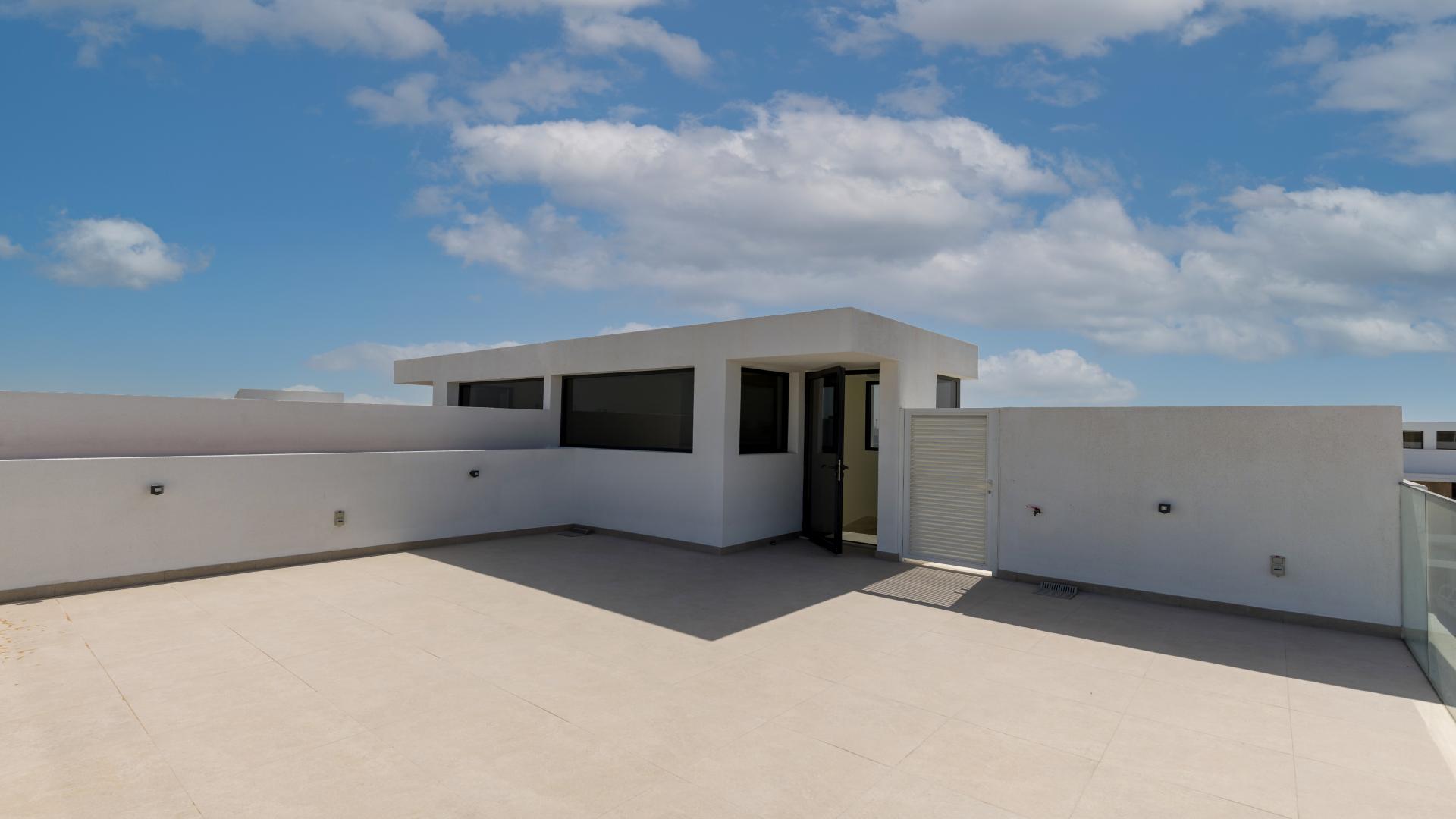 Spacious living room with large windows in Dubai Hills Estate Golf Grove villa