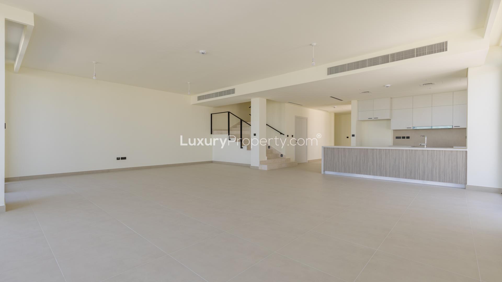 Row of modern villas in Golf Grove, Dubai Hills Estate, available for rent