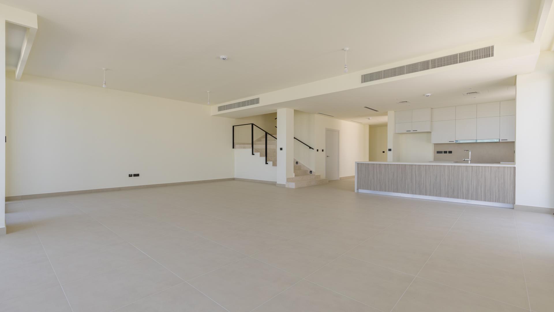 Row of modern villas in Golf Grove, Dubai Hills Estate, available for rent