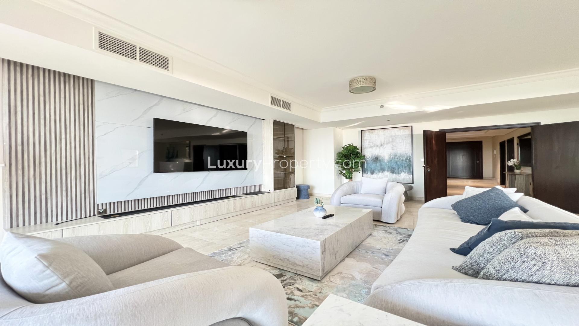 Elegant living room in Palm Jumeirah villa, featuring modern decor and spacious seating area