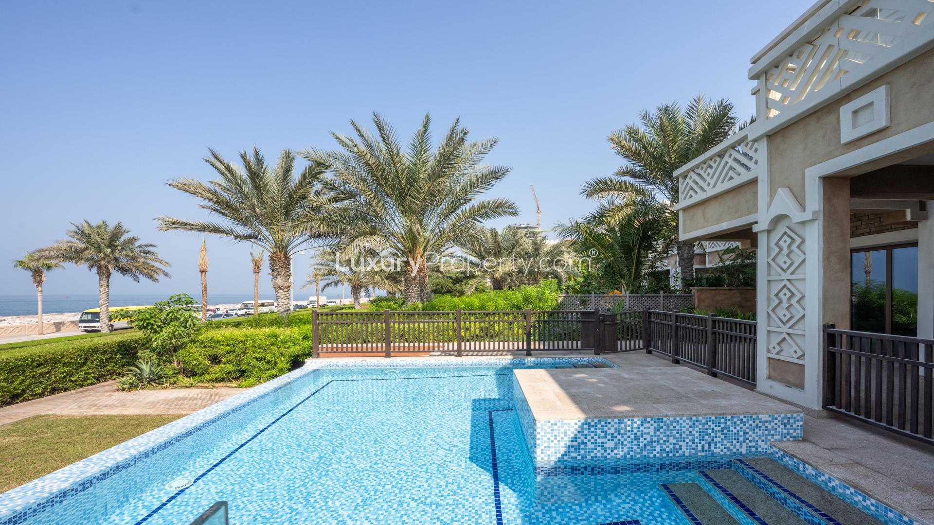 Upgraded villa with pool, lush garden, and beach access in Palm Jumeirah, Kingdom of Sheba
