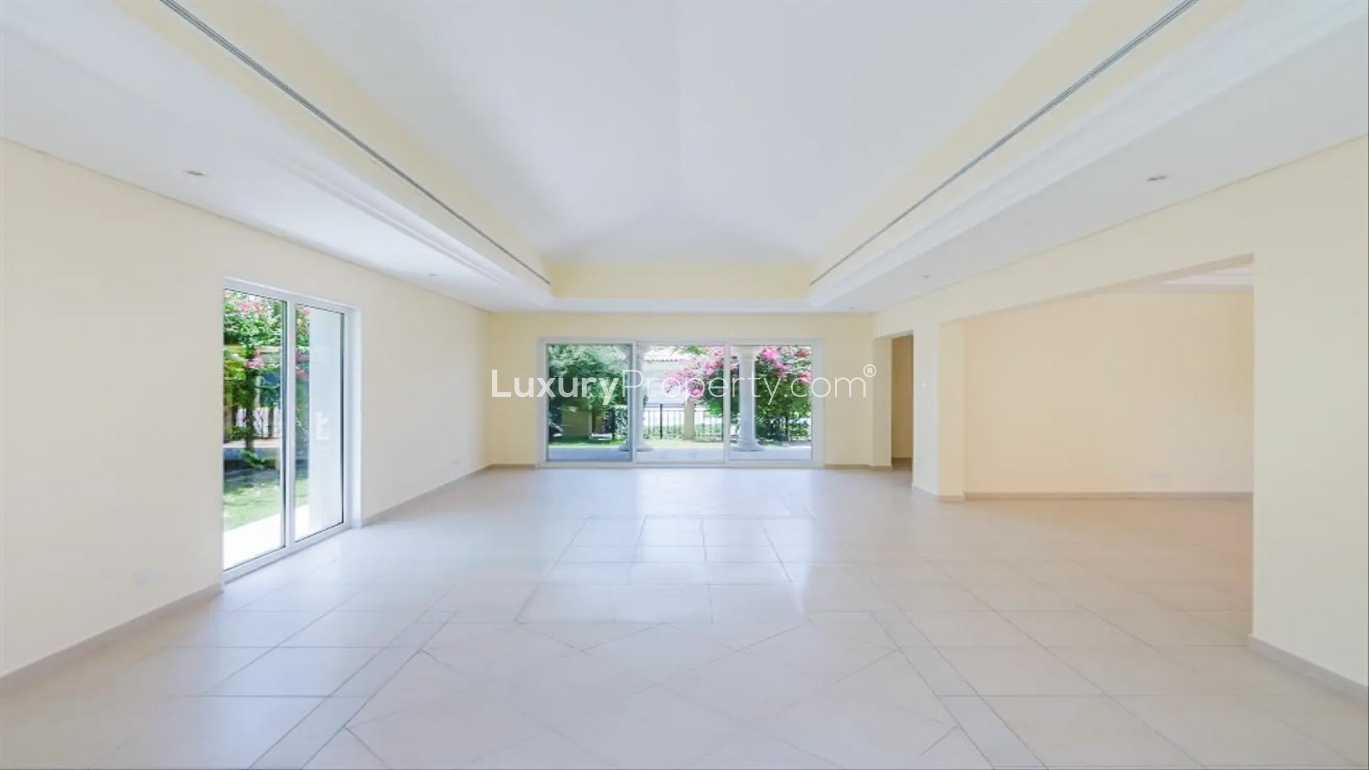Spacious living area in 4-bedroom villa, Green Community West, Dubai, with large windows