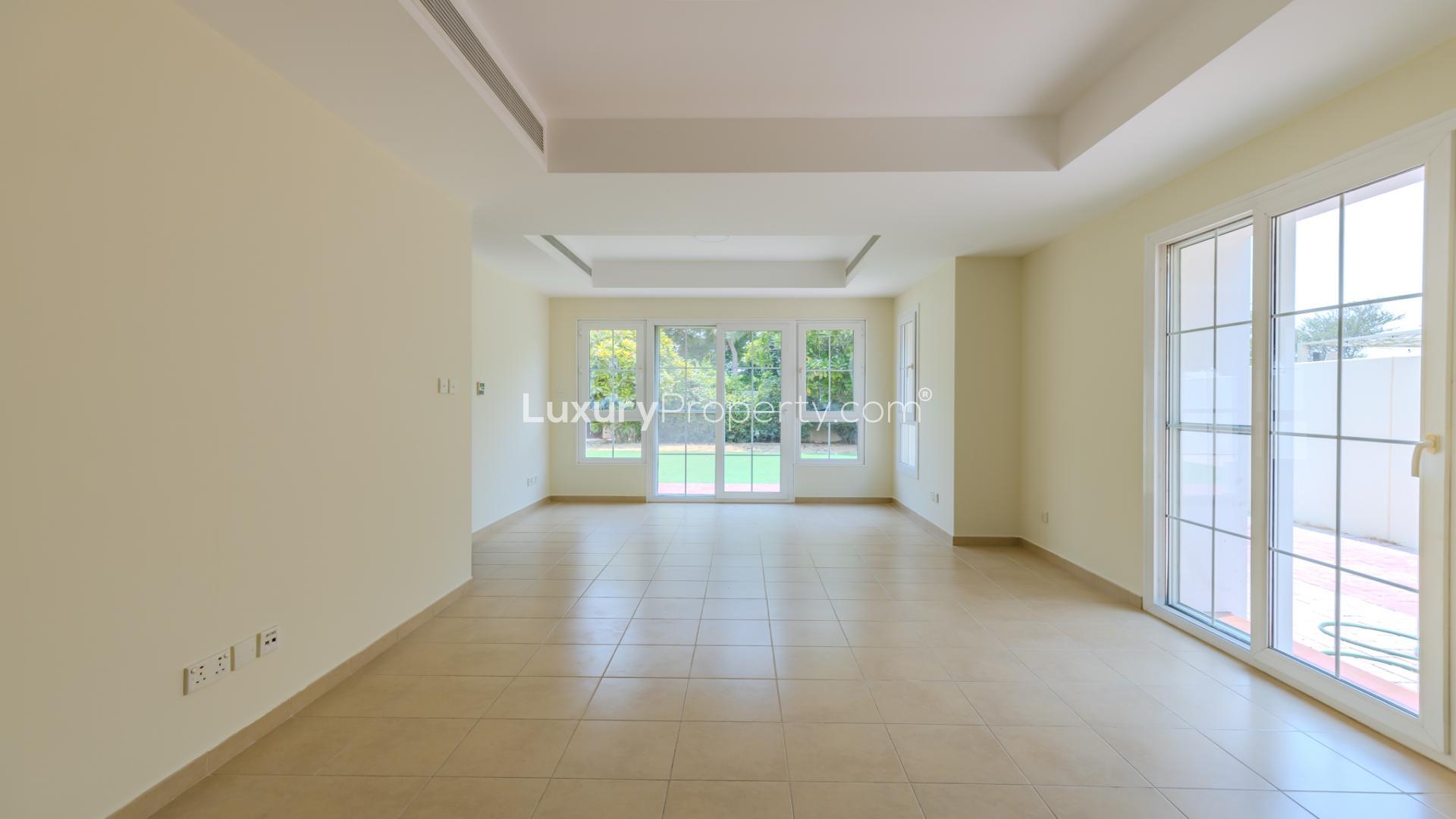 Spacious living room in luxury 4-bed villa at Arabian Ranches, Al Reem for rent