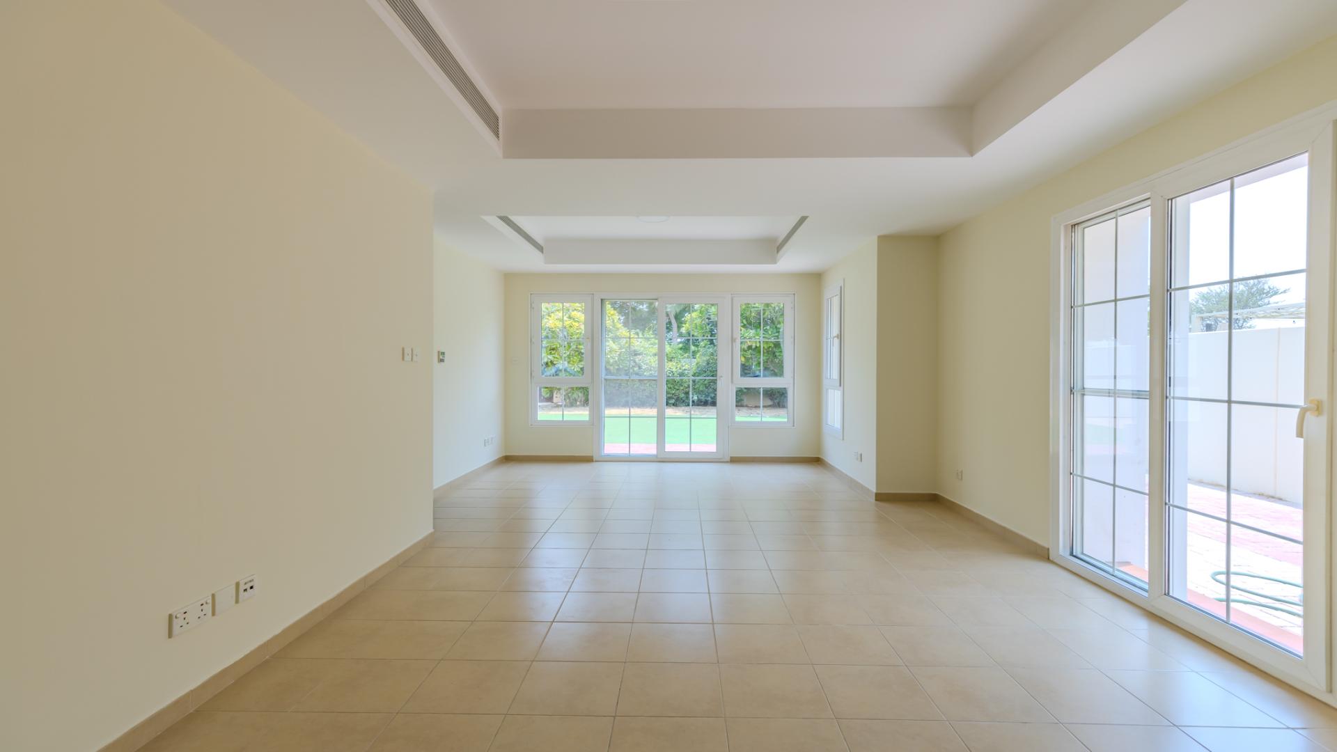 Spacious living room in luxury 4-bed villa at Arabian Ranches, Al Reem for rent