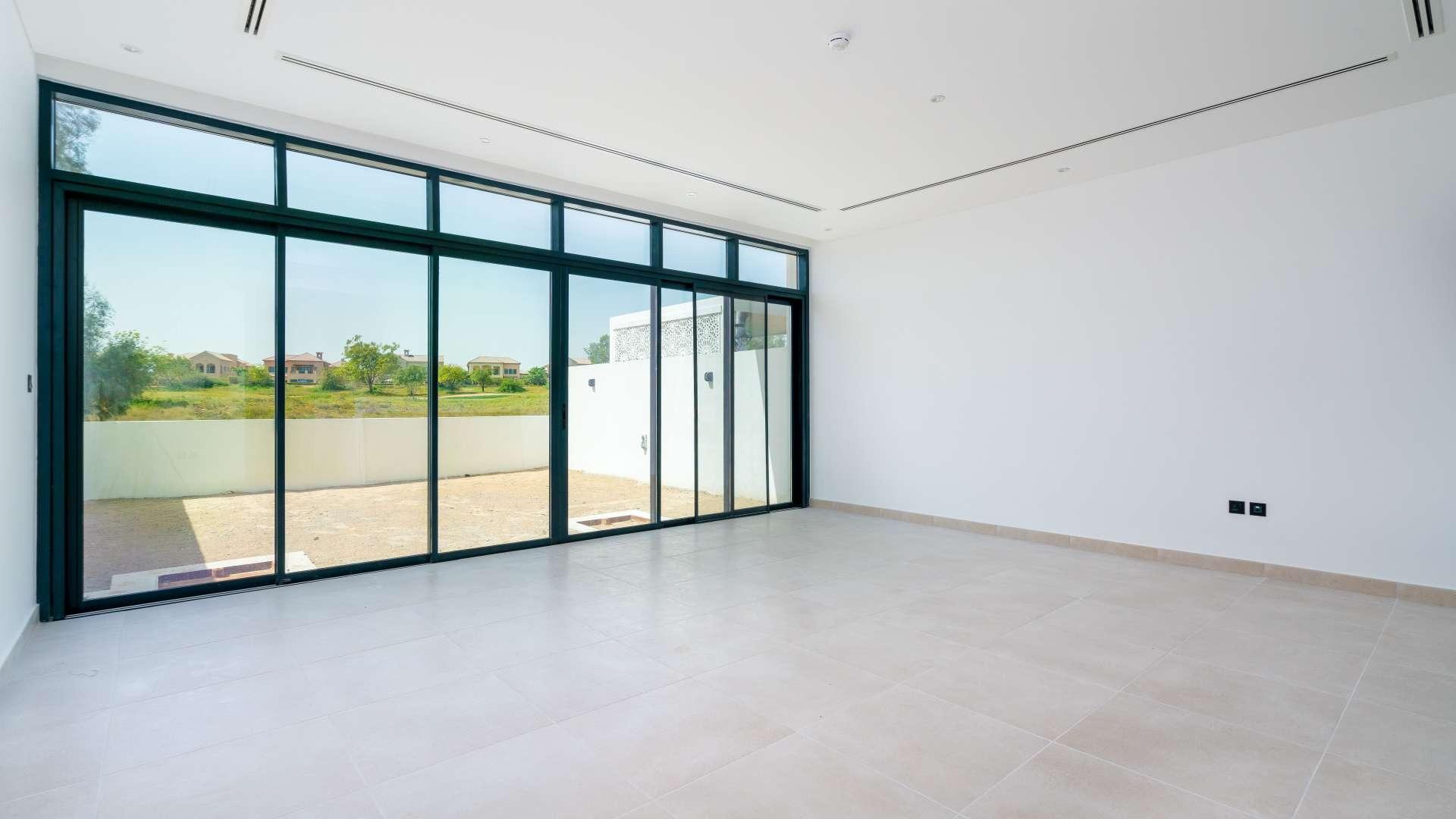 Luxurious Jumeirah Golf Estates villas overlooking lush green golf course, available for rent