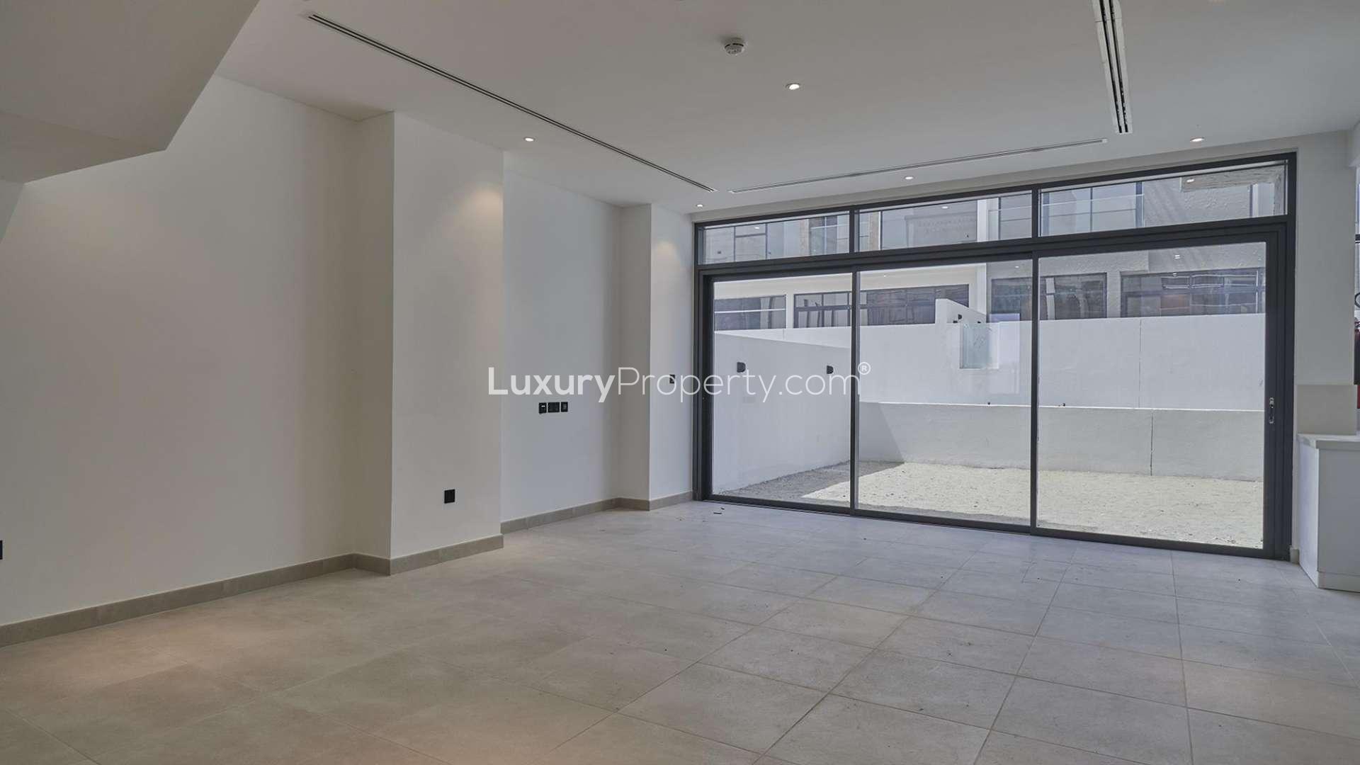 Modern 4-bedroom villa exterior in Jumeirah Luxury, Jumeirah Golf Estates, available for rent